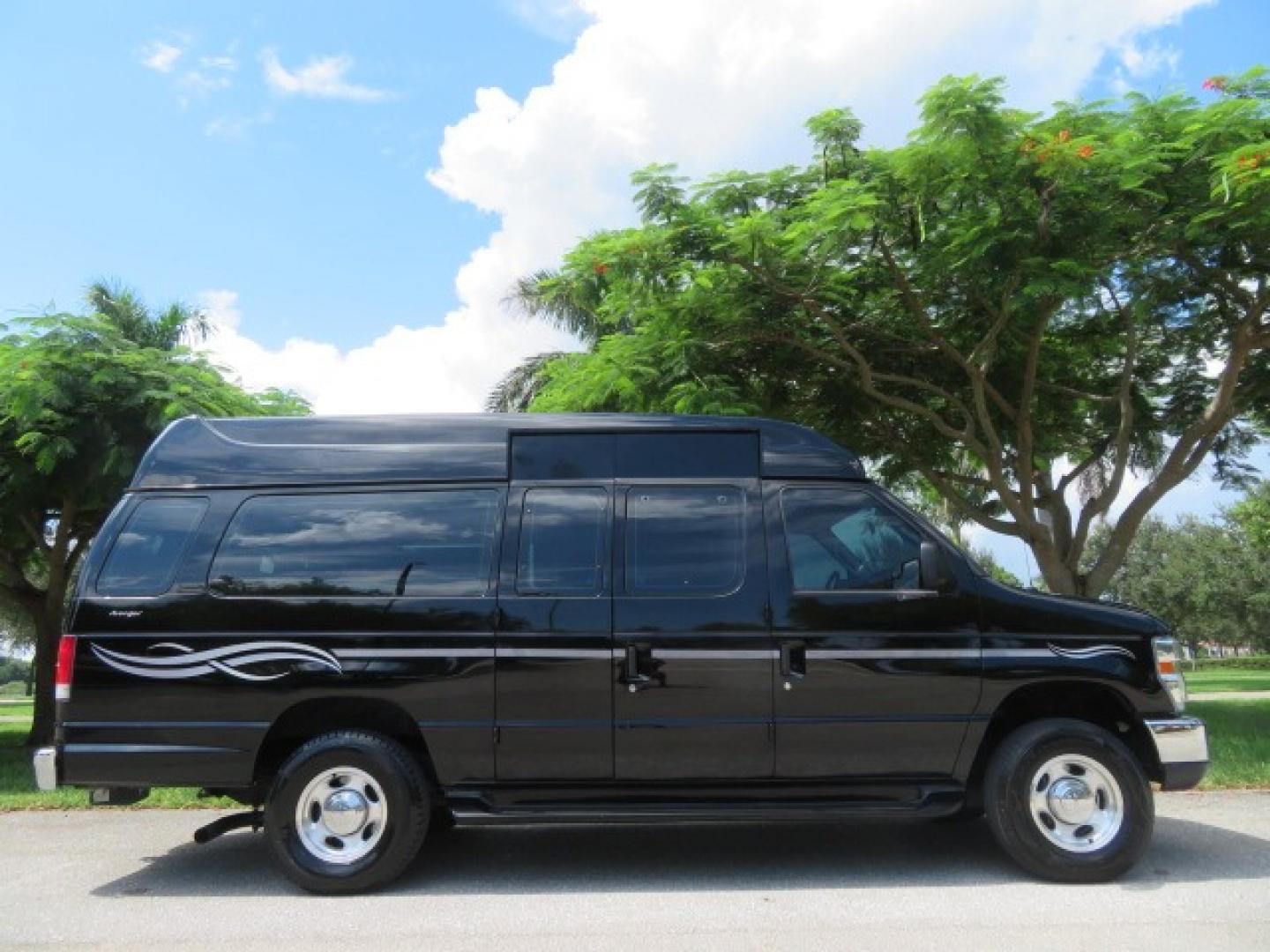 2014 Black Ford E-Series Van E-250 Extended (1FTNS2ELXED) with an 5.4L V8 SOHC 16V FFV engine, 4-Speed Automatic transmission, located at 4301 Oak Circle #19, Boca Raton, FL, 33431, (954) 561-2499, 26.388861, -80.084038 - You are looking at a Gorgeous Black 2014 Ford Econoline E250 Extended Handicap Wheelchair Conversion Van with 21K Original Miles and Fully Loaded with all the options including: Avenger Conversion Package, Ricon Slide Away 600LB Side Entry Wheelchair Lift, Lowered Floor, Expanded Side Entry Doors, P - Photo#4