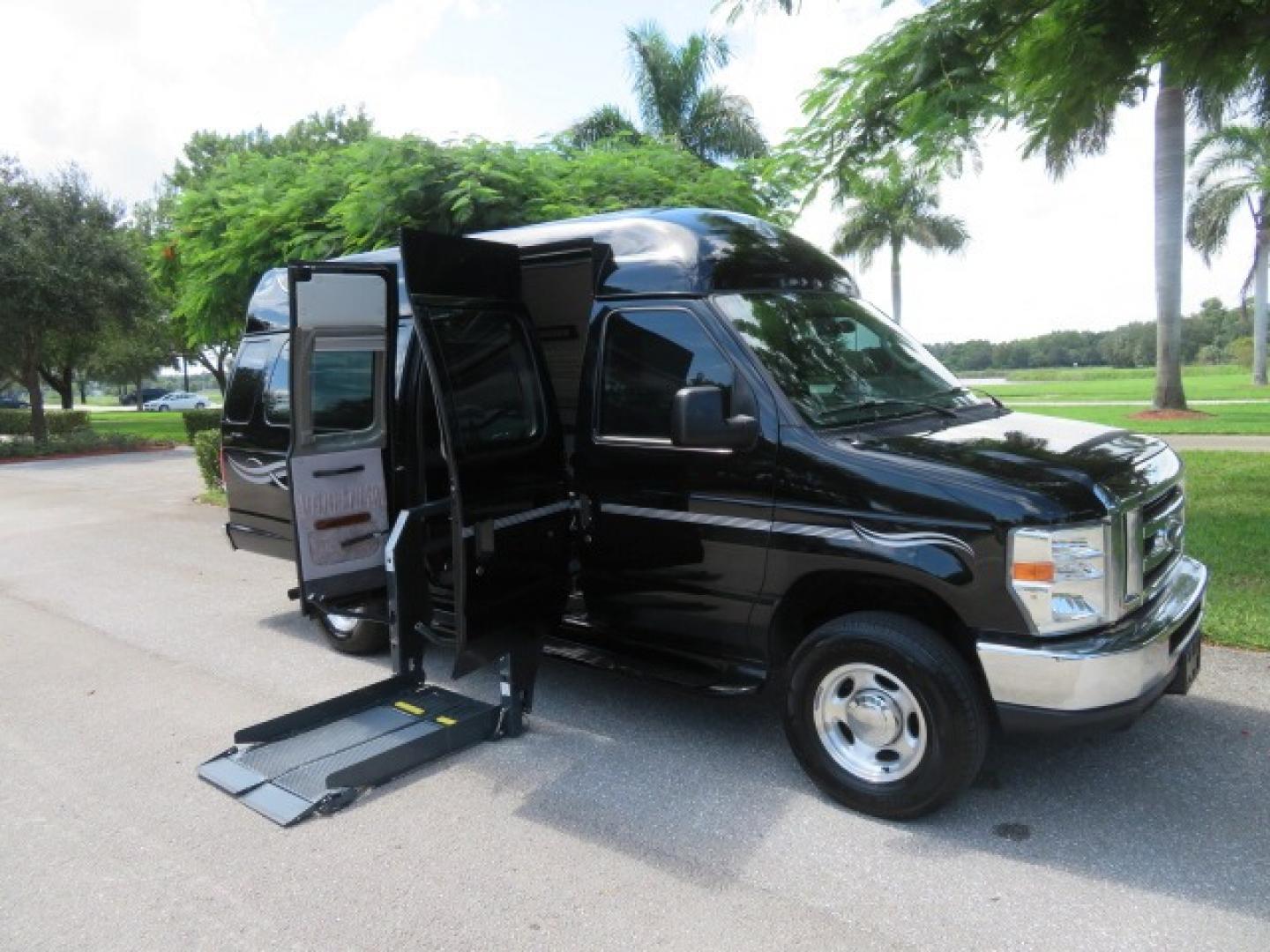 2014 Black Ford E-Series Van E-250 Extended (1FTNS2ELXED) with an 5.4L V8 SOHC 16V FFV engine, 4-Speed Automatic transmission, located at 4301 Oak Circle #19, Boca Raton, FL, 33431, (954) 561-2499, 26.388861, -80.084038 - You are looking at a Gorgeous Black 2014 Ford Econoline E250 Extended Handicap Wheelchair Conversion Van with 21K Original Miles and Fully Loaded with all the options including: Avenger Conversion Package, Ricon Slide Away 600LB Side Entry Wheelchair Lift, Lowered Floor, Expanded Side Entry Doors, P - Photo#48