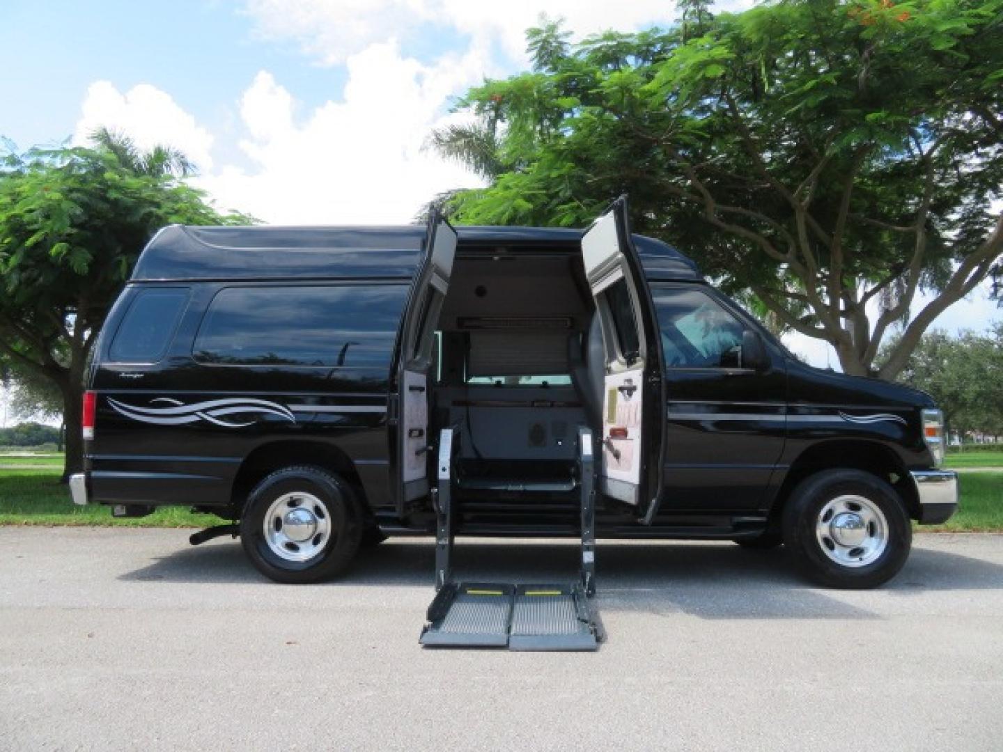 2014 Black Ford E-Series Van E-250 Extended (1FTNS2ELXED) with an 5.4L V8 SOHC 16V FFV engine, 4-Speed Automatic transmission, located at 4301 Oak Circle #19, Boca Raton, FL, 33431, (954) 561-2499, 26.388861, -80.084038 - You are looking at a Gorgeous Black 2014 Ford Econoline E250 Extended Handicap Wheelchair Conversion Van with 21K Original Miles and Fully Loaded with all the options including: Avenger Conversion Package, Ricon Slide Away 600LB Side Entry Wheelchair Lift, Lowered Floor, Expanded Side Entry Doors, P - Photo#49