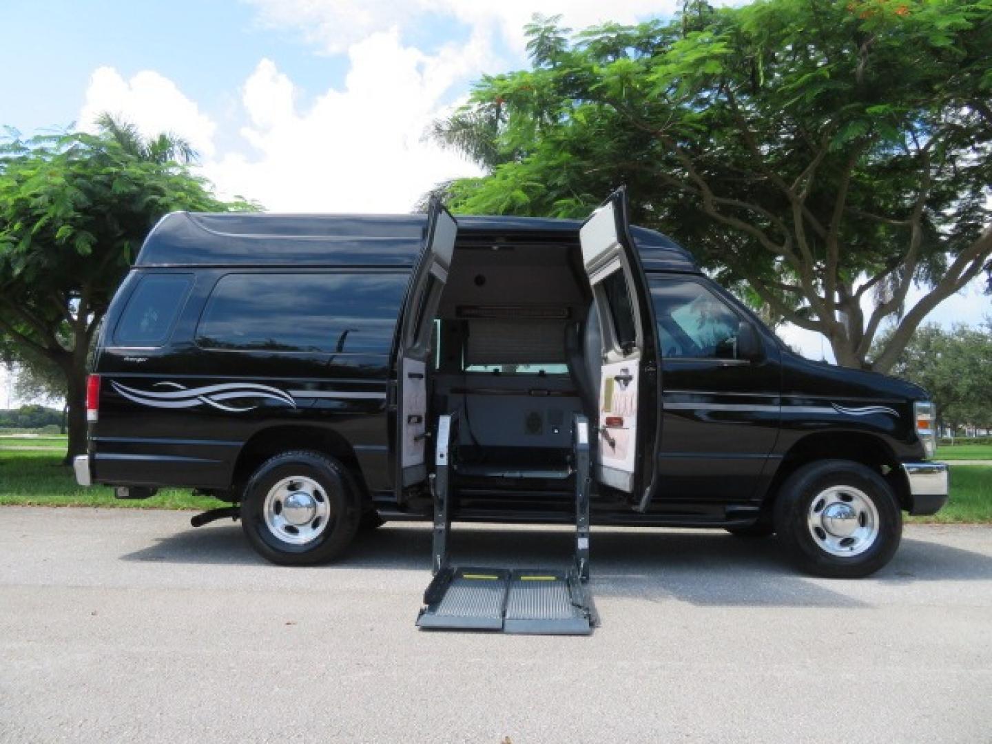 2014 Black Ford E-Series Van E-250 Extended (1FTNS2ELXED) with an 5.4L V8 SOHC 16V FFV engine, 4-Speed Automatic transmission, located at 4301 Oak Circle #19, Boca Raton, FL, 33431, (954) 561-2499, 26.388861, -80.084038 - You are looking at a Gorgeous Black 2014 Ford Econoline E250 Extended Handicap Wheelchair Conversion Van with 21K Original Miles and Fully Loaded with all the options including: Avenger Conversion Package, Ricon Slide Away 600LB Side Entry Wheelchair Lift, Lowered Floor, Expanded Side Entry Doors, P - Photo#50