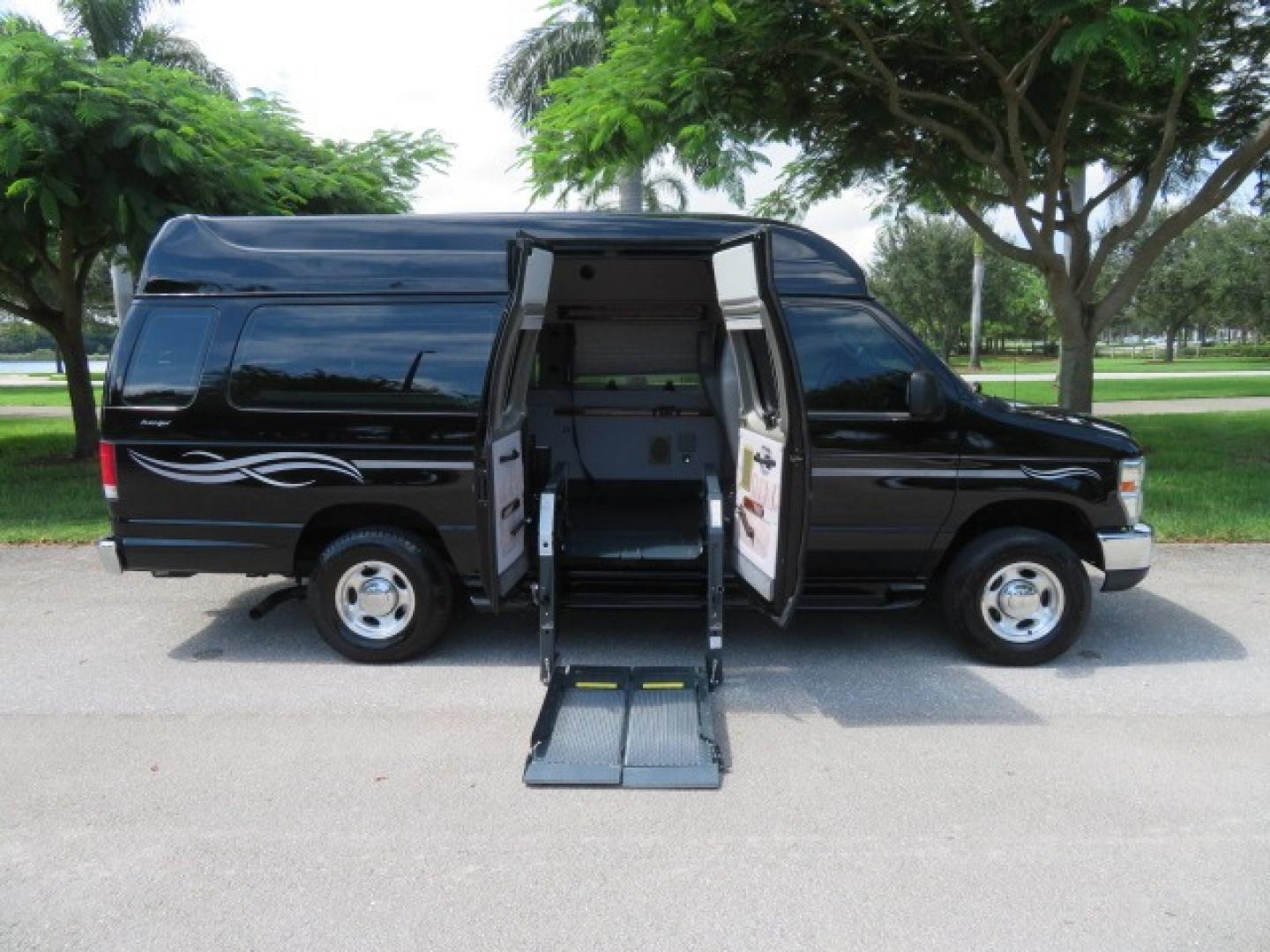 2014 Black Ford E-Series Van E-250 Extended (1FTNS2ELXED) with an 5.4L V8 SOHC 16V FFV engine, 4-Speed Automatic transmission, located at 4301 Oak Circle #19, Boca Raton, FL, 33431, (954) 561-2499, 26.388861, -80.084038 - You are looking at a Gorgeous Black 2014 Ford Econoline E250 Extended Handicap Wheelchair Conversion Van with 21K Original Miles and Fully Loaded with all the options including: Avenger Conversion Package, Ricon Slide Away 600LB Side Entry Wheelchair Lift, Lowered Floor, Expanded Side Entry Doors, P - Photo#51