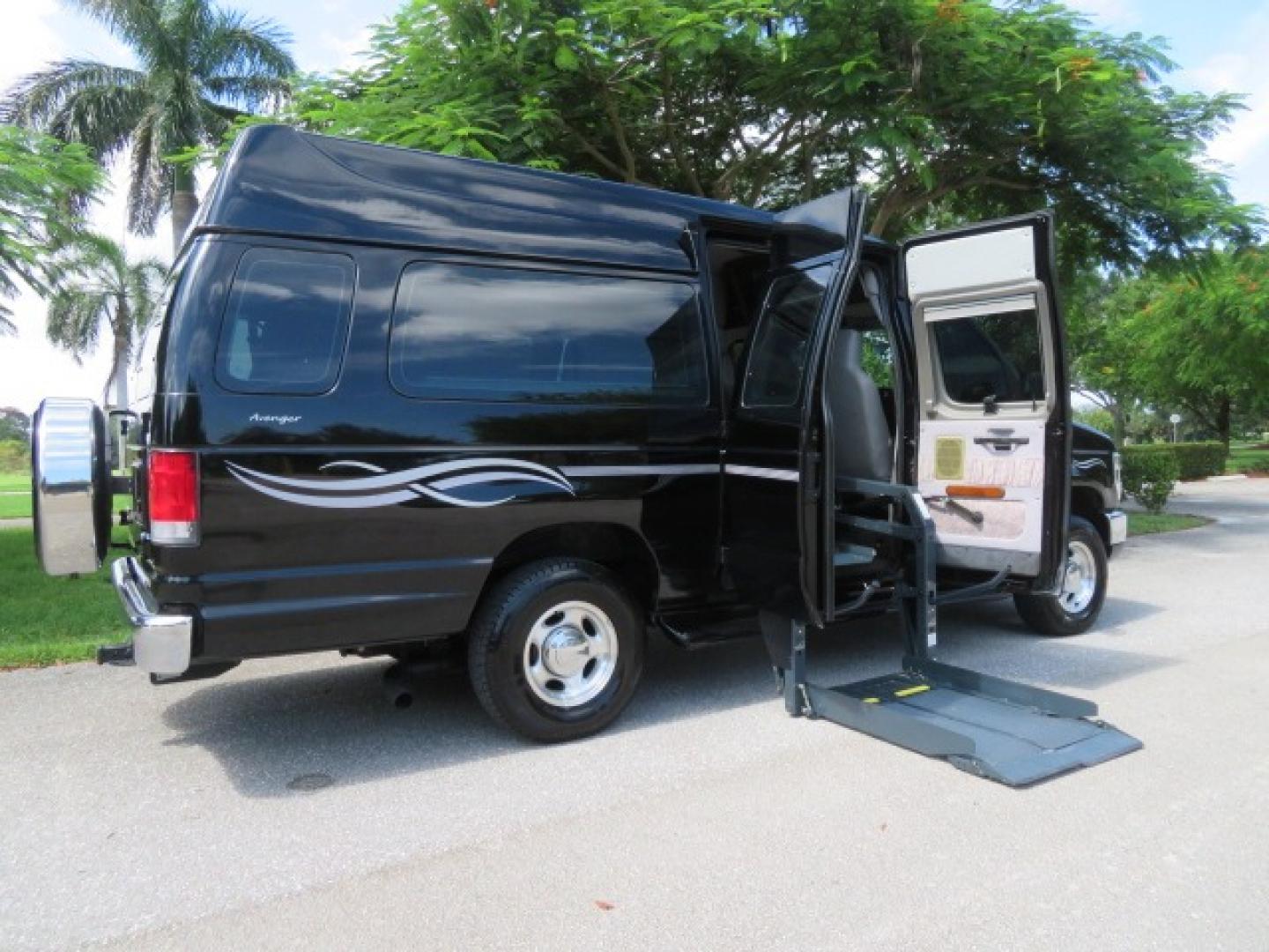 2014 Black Ford E-Series Van E-250 Extended (1FTNS2ELXED) with an 5.4L V8 SOHC 16V FFV engine, 4-Speed Automatic transmission, located at 4301 Oak Circle #19, Boca Raton, FL, 33431, (954) 561-2499, 26.388861, -80.084038 - You are looking at a Gorgeous Black 2014 Ford Econoline E250 Extended Handicap Wheelchair Conversion Van with 21K Original Miles and Fully Loaded with all the options including: Avenger Conversion Package, Ricon Slide Away 600LB Side Entry Wheelchair Lift, Lowered Floor, Expanded Side Entry Doors, P - Photo#53