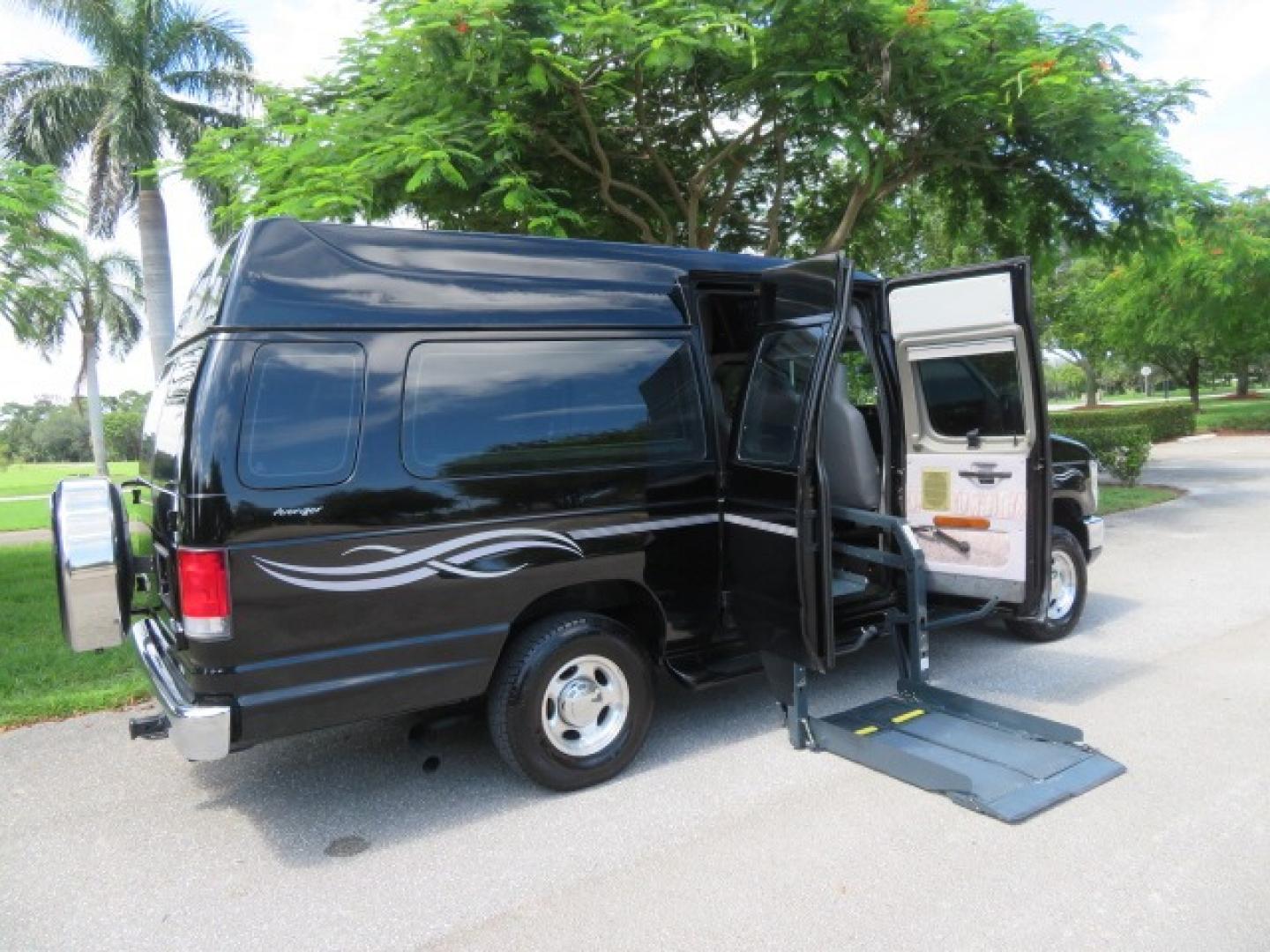 2014 Black Ford E-Series Van E-250 Extended (1FTNS2ELXED) with an 5.4L V8 SOHC 16V FFV engine, 4-Speed Automatic transmission, located at 4301 Oak Circle #19, Boca Raton, FL, 33431, (954) 561-2499, 26.388861, -80.084038 - You are looking at a Gorgeous Black 2014 Ford Econoline E250 Extended Handicap Wheelchair Conversion Van with 21K Original Miles and Fully Loaded with all the options including: Avenger Conversion Package, Ricon Slide Away 600LB Side Entry Wheelchair Lift, Lowered Floor, Expanded Side Entry Doors, P - Photo#55