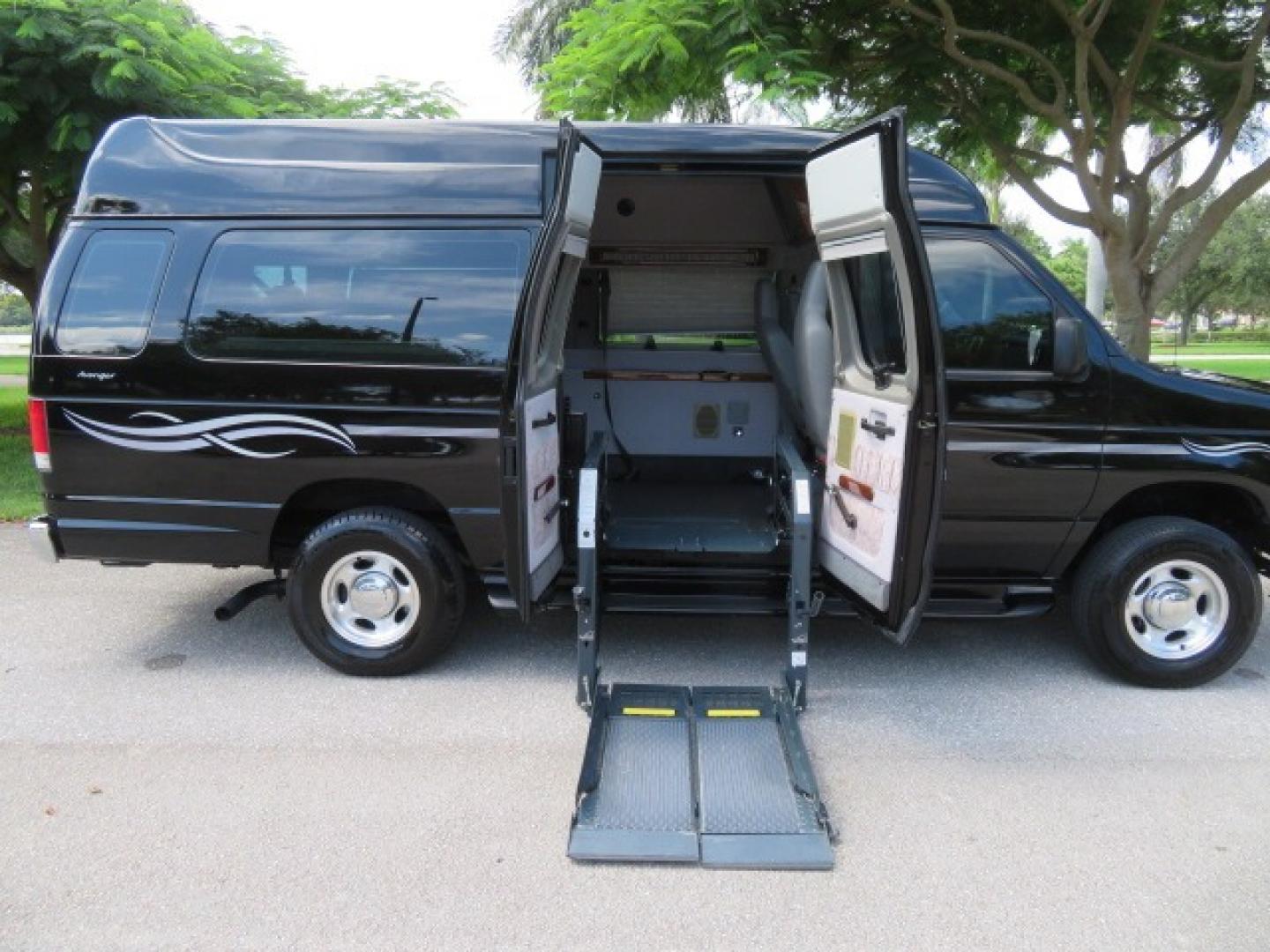 2014 Black Ford E-Series Van E-250 Extended (1FTNS2ELXED) with an 5.4L V8 SOHC 16V FFV engine, 4-Speed Automatic transmission, located at 4301 Oak Circle #19, Boca Raton, FL, 33431, (954) 561-2499, 26.388861, -80.084038 - You are looking at a Gorgeous Black 2014 Ford Econoline E250 Extended Handicap Wheelchair Conversion Van with 21K Original Miles and Fully Loaded with all the options including: Avenger Conversion Package, Ricon Slide Away 600LB Side Entry Wheelchair Lift, Lowered Floor, Expanded Side Entry Doors, P - Photo#56