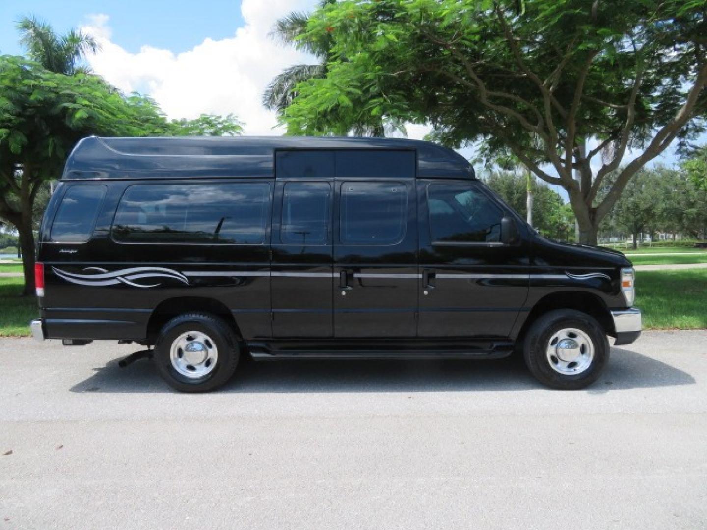 2014 Black Ford E-Series Van E-250 Extended (1FTNS2ELXED) with an 5.4L V8 SOHC 16V FFV engine, 4-Speed Automatic transmission, located at 4301 Oak Circle #19, Boca Raton, FL, 33431, (954) 561-2499, 26.388861, -80.084038 - You are looking at a Gorgeous Black 2014 Ford Econoline E250 Extended Handicap Wheelchair Conversion Van with 21K Original Miles and Fully Loaded with all the options including: Avenger Conversion Package, Ricon Slide Away 600LB Side Entry Wheelchair Lift, Lowered Floor, Expanded Side Entry Doors, P - Photo#5