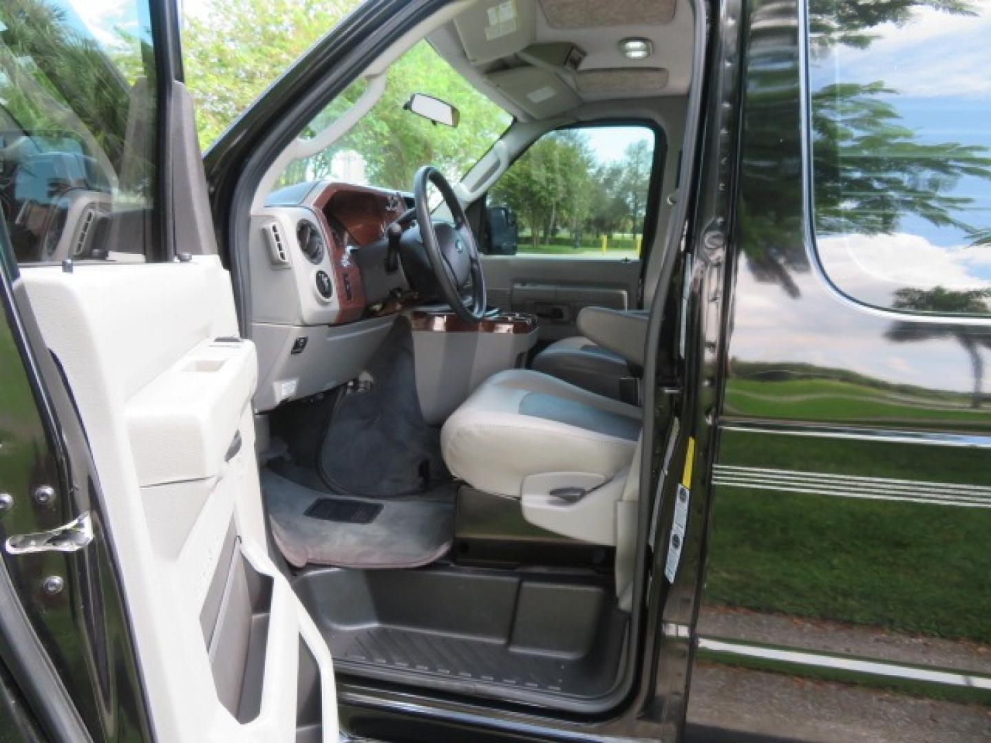 2014 Black Ford E-Series Van E-250 Extended (1FTNS2ELXED) with an 5.4L V8 SOHC 16V FFV engine, 4-Speed Automatic transmission, located at 4301 Oak Circle #19, Boca Raton, FL, 33431, (954) 561-2499, 26.388861, -80.084038 - You are looking at a Gorgeous Black 2014 Ford Econoline E250 Extended Handicap Wheelchair Conversion Van with 21K Original Miles and Fully Loaded with all the options including: Avenger Conversion Package, Ricon Slide Away 600LB Side Entry Wheelchair Lift, Lowered Floor, Expanded Side Entry Doors, P - Photo#82