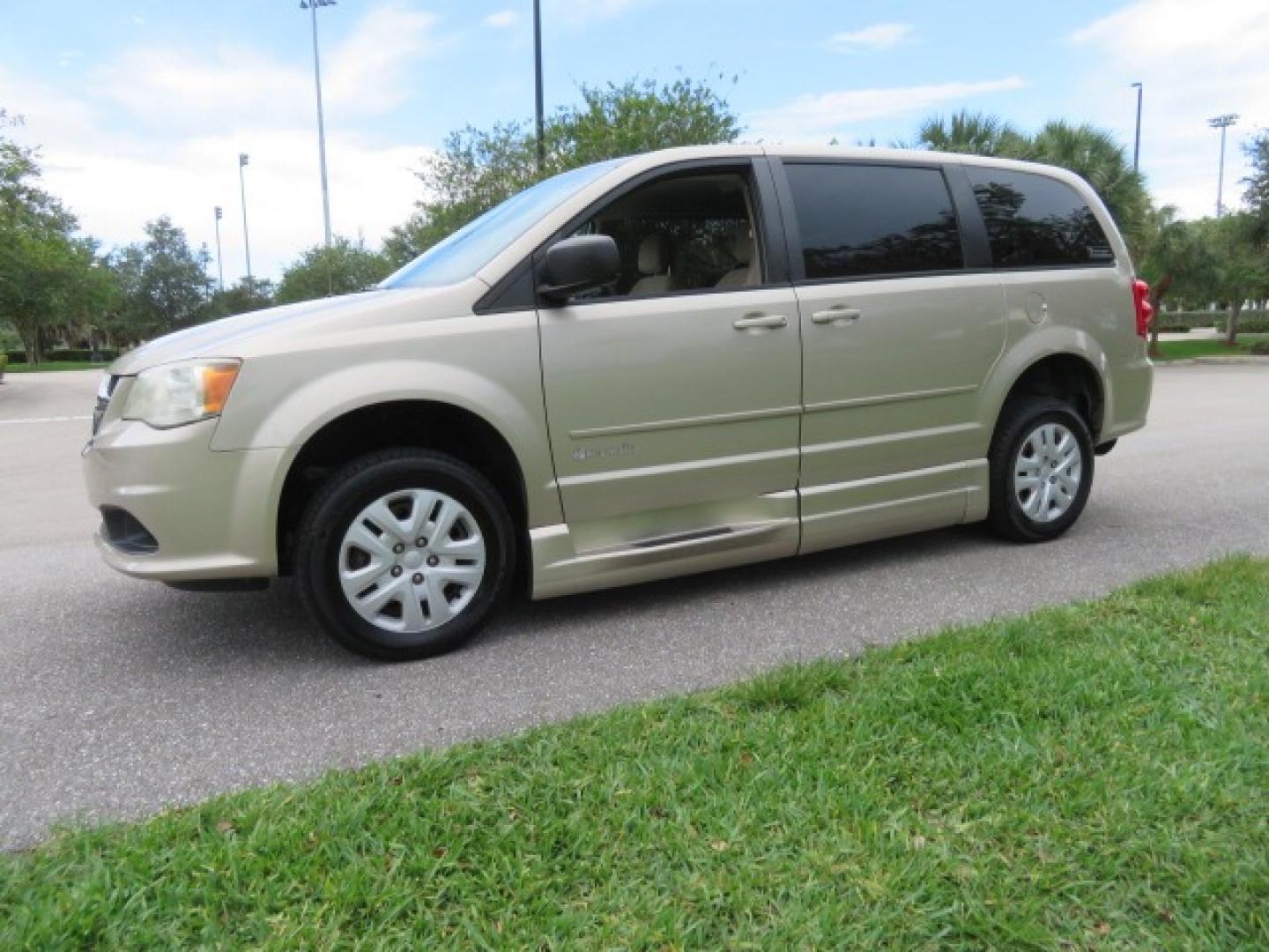 2013 Gold /Tan Dodge Grand Caravan SE (2C4RDGBG8DR) with an 3.6L V6 DOHC 24V engine, 6-Speed Automatic transmission, located at 4301 Oak Circle #19, Boca Raton, FL, 33431, (954) 561-2499, 26.388861, -80.084038 - You are looking at a Gorgeous 2015 Dodge Grand Caravan Braunability Handicap Wheelchair Side Entry, Conversion Van with 18K Original Miles, Lowered Floor, Kneelvan, EZ Lock Passenger Side, Q Straint Ratchet Tie Down System, Quick Release Front Seats, and Much Much More. This is a Beautiful Florida V - Photo#14