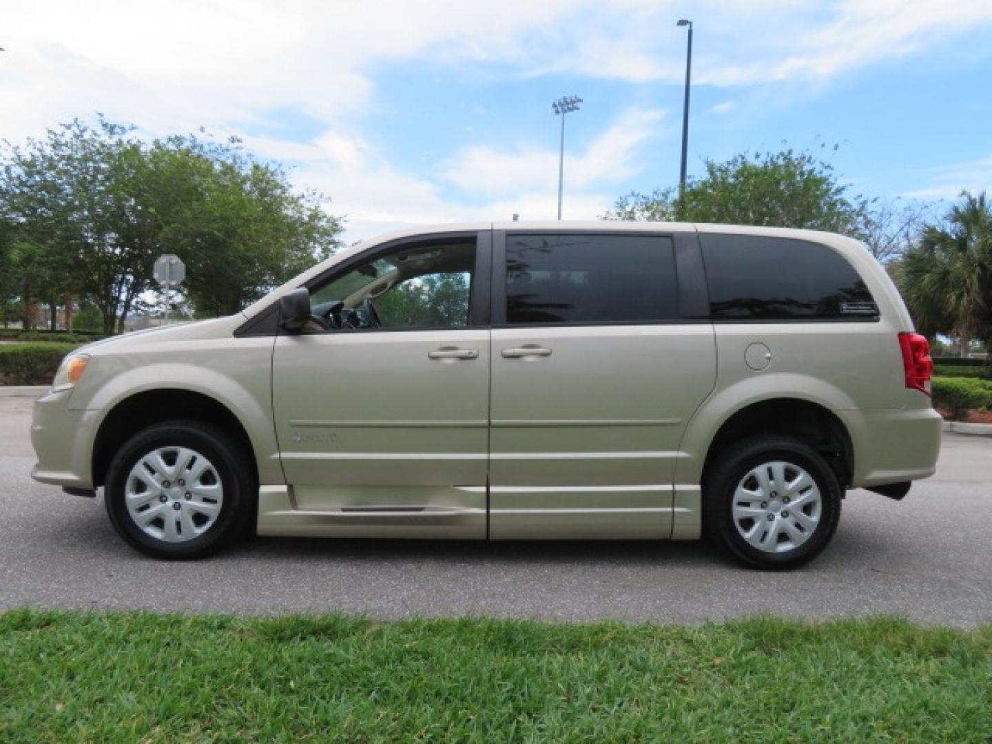 2013 Gold /Tan Dodge Grand Caravan SE (2C4RDGBG8DR) with an 3.6L V6 DOHC 24V engine, 6-Speed Automatic transmission, located at 4301 Oak Circle #19, Boca Raton, FL, 33431, (954) 561-2499, 26.388861, -80.084038 - You are looking at a Gorgeous 2015 Dodge Grand Caravan Braunability Handicap Wheelchair Side Entry, Conversion Van with 18K Original Miles, Lowered Floor, Kneelvan, EZ Lock Passenger Side, Q Straint Ratchet Tie Down System, Quick Release Front Seats, and Much Much More. This is a Beautiful Florida V - Photo#15