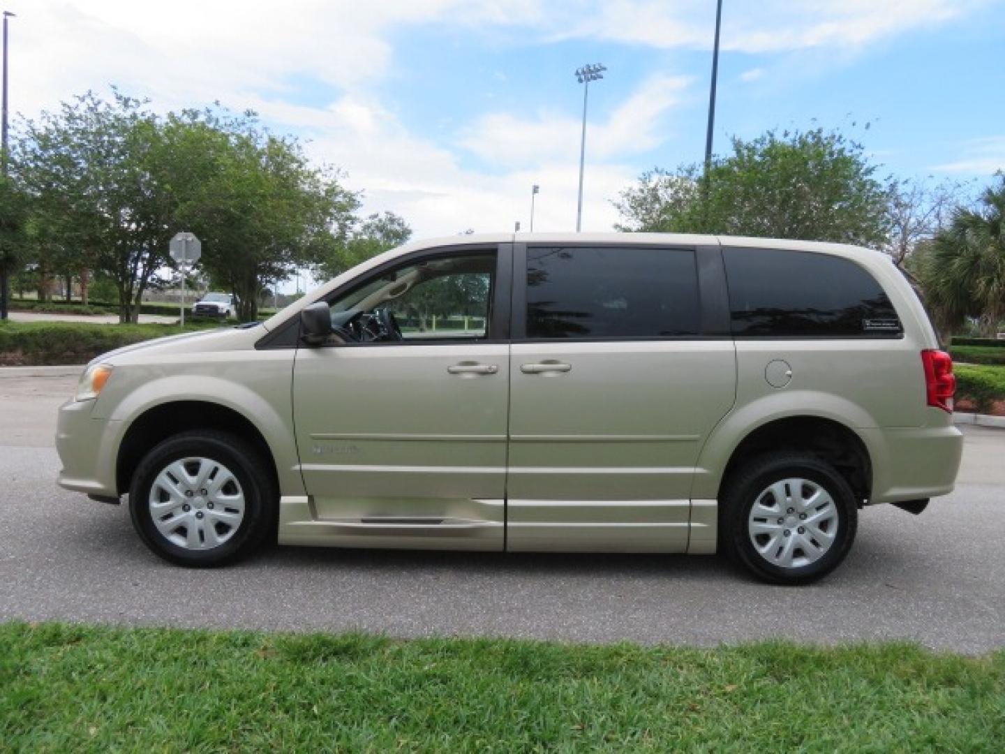 2013 Gold /Tan Dodge Grand Caravan SE (2C4RDGBG8DR) with an 3.6L V6 DOHC 24V engine, 6-Speed Automatic transmission, located at 4301 Oak Circle #19, Boca Raton, FL, 33431, (954) 561-2499, 26.388861, -80.084038 - You are looking at a Gorgeous 2015 Dodge Grand Caravan Braunability Handicap Wheelchair Side Entry, Conversion Van with 18K Original Miles, Lowered Floor, Kneelvan, EZ Lock Passenger Side, Q Straint Ratchet Tie Down System, Quick Release Front Seats, and Much Much More. This is a Beautiful Florida V - Photo#16