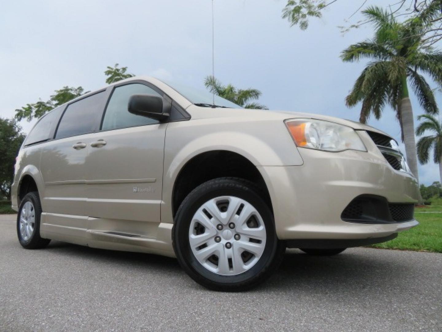 2013 Gold /Tan Dodge Grand Caravan SE (2C4RDGBG8DR) with an 3.6L V6 DOHC 24V engine, 6-Speed Automatic transmission, located at 4301 Oak Circle #19, Boca Raton, FL, 33431, (954) 561-2499, 26.388861, -80.084038 - You are looking at a Gorgeous 2015 Dodge Grand Caravan Braunability Handicap Wheelchair Side Entry, Conversion Van with 18K Original Miles, Lowered Floor, Kneelvan, EZ Lock Passenger Side, Q Straint Ratchet Tie Down System, Quick Release Front Seats, and Much Much More. This is a Beautiful Florida V - Photo#1