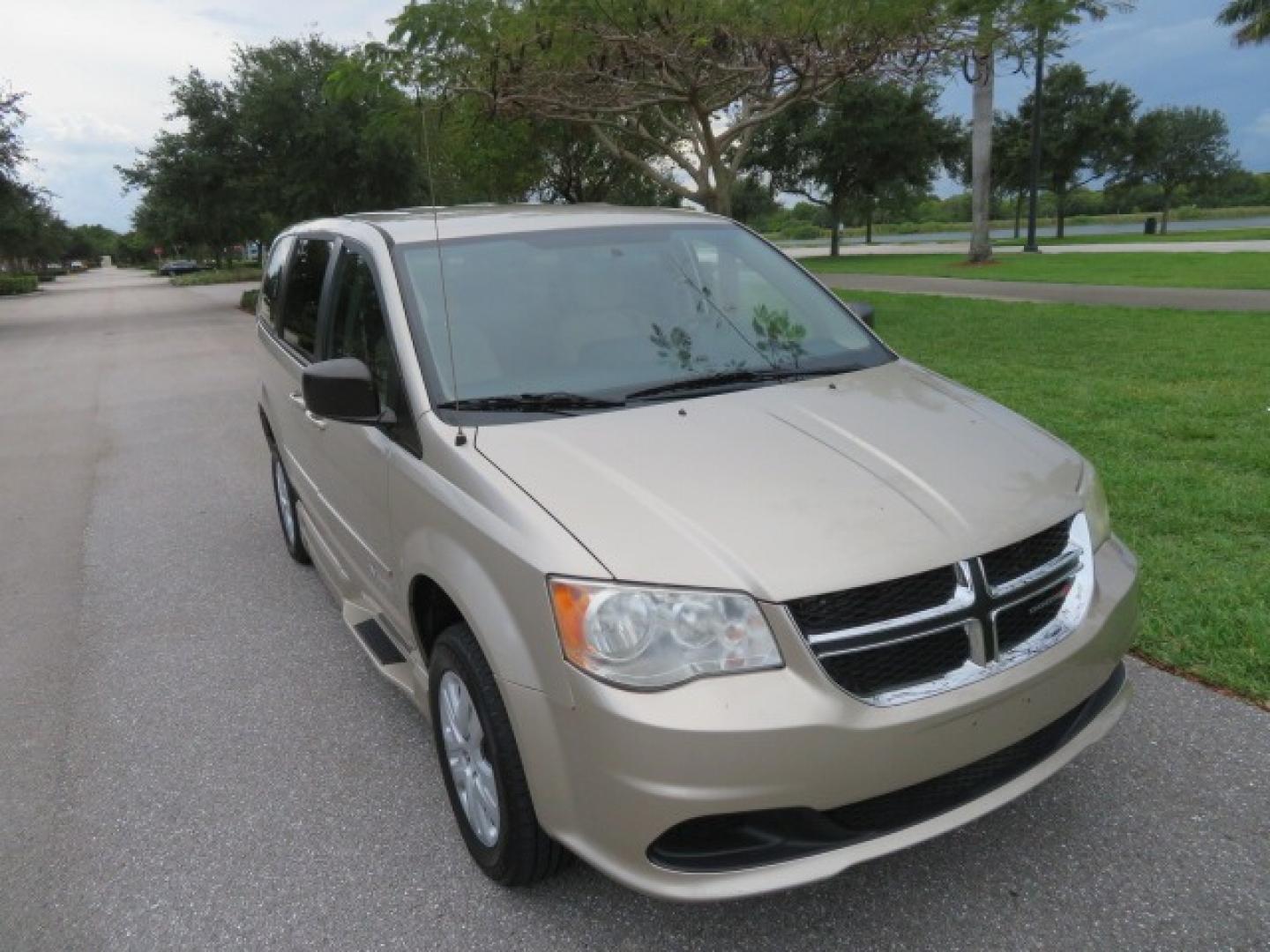 2013 Gold /Tan Dodge Grand Caravan SE (2C4RDGBG8DR) with an 3.6L V6 DOHC 24V engine, 6-Speed Automatic transmission, located at 4301 Oak Circle #19, Boca Raton, FL, 33431, (954) 561-2499, 26.388861, -80.084038 - You are looking at a Gorgeous 2015 Dodge Grand Caravan Braunability Handicap Wheelchair Side Entry, Conversion Van with 18K Original Miles, Lowered Floor, Kneelvan, EZ Lock Passenger Side, Q Straint Ratchet Tie Down System, Quick Release Front Seats, and Much Much More. This is a Beautiful Florida V - Photo#26