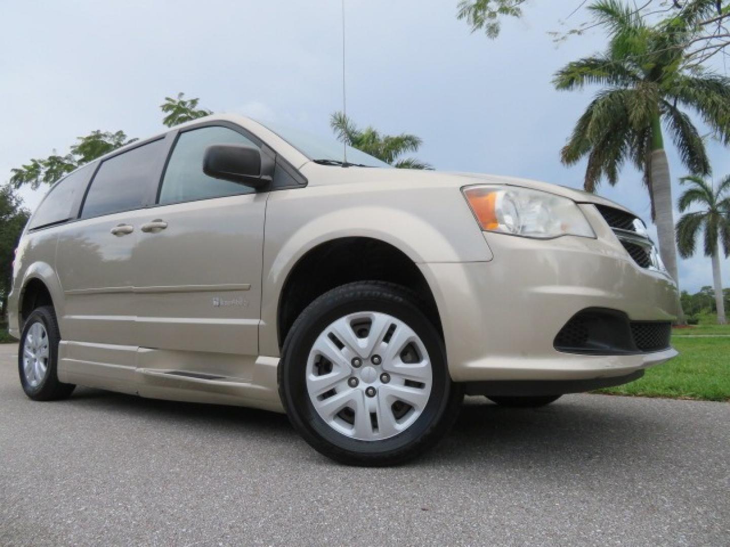 2013 Gold /Tan Dodge Grand Caravan SE (2C4RDGBG8DR) with an 3.6L V6 DOHC 24V engine, 6-Speed Automatic transmission, located at 4301 Oak Circle #19, Boca Raton, FL, 33431, (954) 561-2499, 26.388861, -80.084038 - You are looking at a Gorgeous 2015 Dodge Grand Caravan Braunability Handicap Wheelchair Side Entry, Conversion Van with 18K Original Miles, Lowered Floor, Kneelvan, EZ Lock Passenger Side, Q Straint Ratchet Tie Down System, Quick Release Front Seats, and Much Much More. This is a Beautiful Florida V - Photo#2