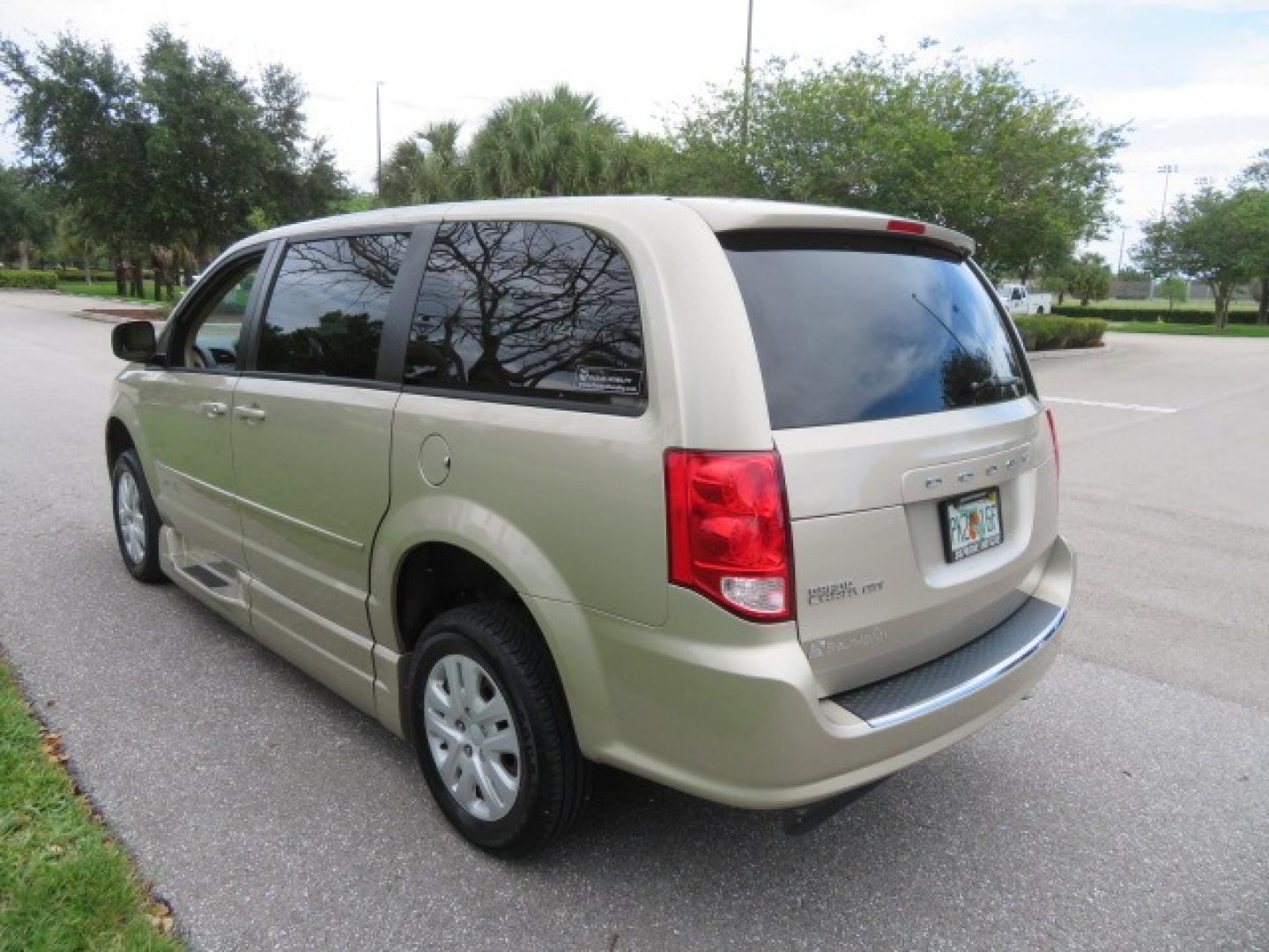 2013 Gold /Tan Dodge Grand Caravan SE (2C4RDGBG8DR) with an 3.6L V6 DOHC 24V engine, 6-Speed Automatic transmission, located at 4301 Oak Circle #19, Boca Raton, FL, 33431, (954) 561-2499, 26.388861, -80.084038 - You are looking at a Gorgeous 2015 Dodge Grand Caravan Braunability Handicap Wheelchair Side Entry, Conversion Van with 18K Original Miles, Lowered Floor, Kneelvan, EZ Lock Passenger Side, Q Straint Ratchet Tie Down System, Quick Release Front Seats, and Much Much More. This is a Beautiful Florida V - Photo#31