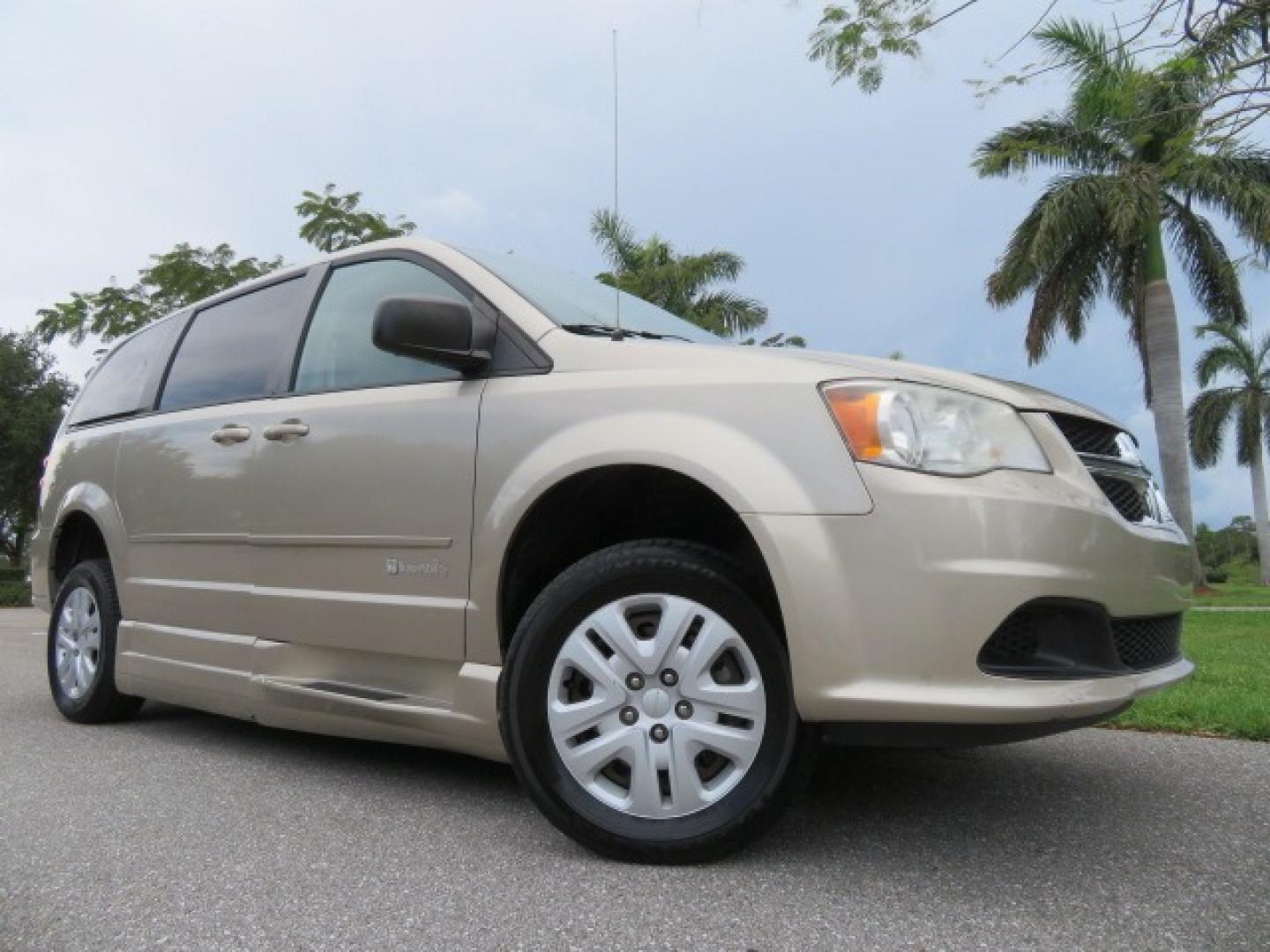 2013 Gold /Tan Dodge Grand Caravan SE (2C4RDGBG8DR) with an 3.6L V6 DOHC 24V engine, 6-Speed Automatic transmission, located at 4301 Oak Circle #19, Boca Raton, FL, 33431, (954) 561-2499, 26.388861, -80.084038 - You are looking at a Gorgeous 2015 Dodge Grand Caravan Braunability Handicap Wheelchair Side Entry, Conversion Van with 18K Original Miles, Lowered Floor, Kneelvan, EZ Lock Passenger Side, Q Straint Ratchet Tie Down System, Quick Release Front Seats, and Much Much More. This is a Beautiful Florida V - Photo#3