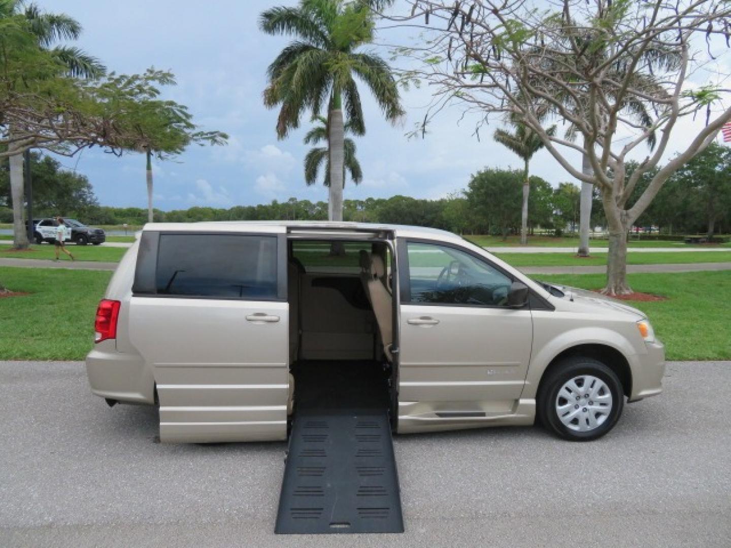 2013 Gold /Tan Dodge Grand Caravan SE (2C4RDGBG8DR) with an 3.6L V6 DOHC 24V engine, 6-Speed Automatic transmission, located at 4301 Oak Circle #19, Boca Raton, FL, 33431, (954) 561-2499, 26.388861, -80.084038 - You are looking at a Gorgeous 2015 Dodge Grand Caravan Braunability Handicap Wheelchair Side Entry, Conversion Van with 18K Original Miles, Lowered Floor, Kneelvan, EZ Lock Passenger Side, Q Straint Ratchet Tie Down System, Quick Release Front Seats, and Much Much More. This is a Beautiful Florida V - Photo#46