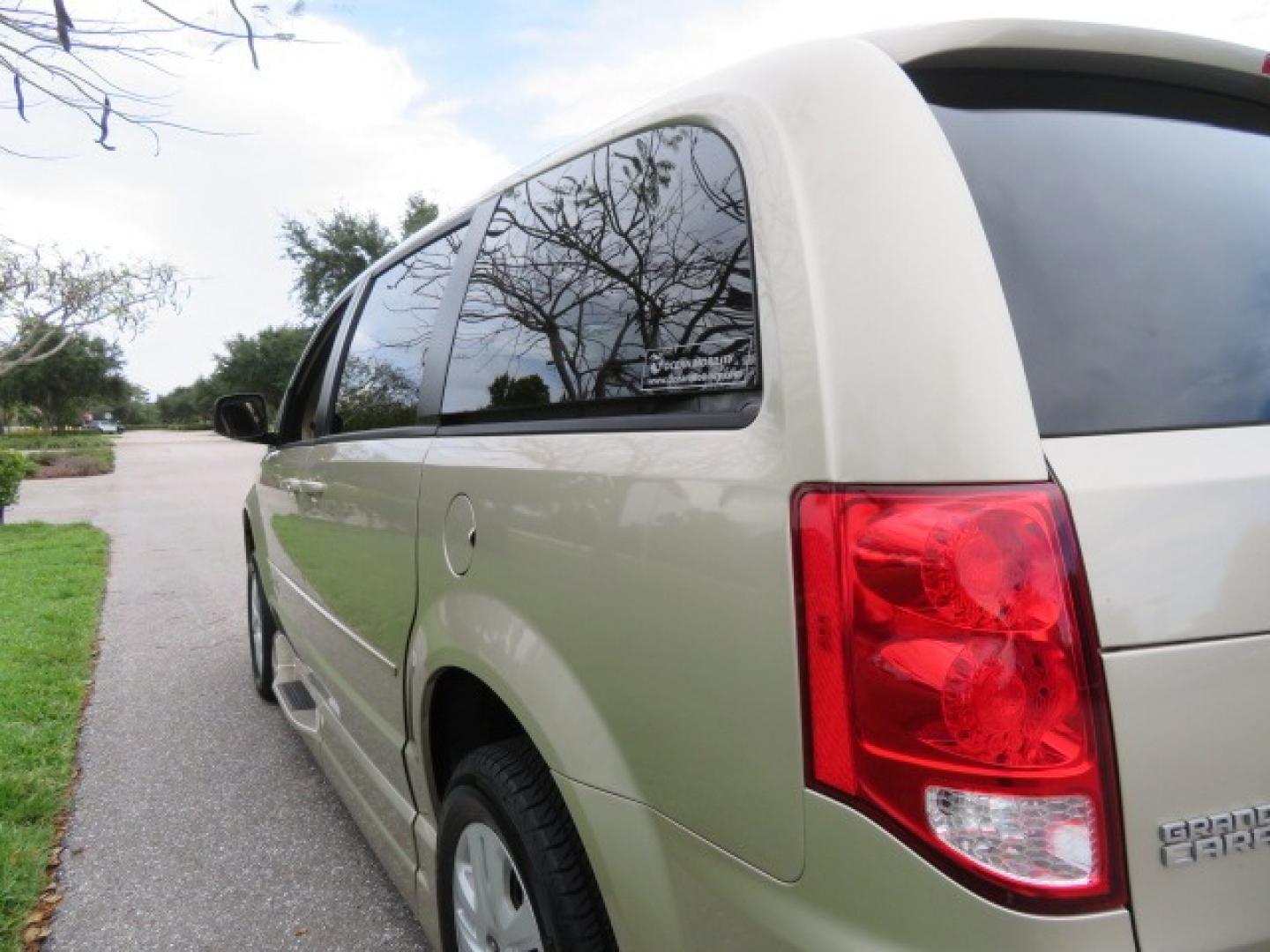 2013 Gold /Tan Dodge Grand Caravan SE (2C4RDGBG8DR) with an 3.6L V6 DOHC 24V engine, 6-Speed Automatic transmission, located at 4301 Oak Circle #19, Boca Raton, FL, 33431, (954) 561-2499, 26.388861, -80.084038 - You are looking at a Gorgeous 2015 Dodge Grand Caravan Braunability Handicap Wheelchair Side Entry, Conversion Van with 18K Original Miles, Lowered Floor, Kneelvan, EZ Lock Passenger Side, Q Straint Ratchet Tie Down System, Quick Release Front Seats, and Much Much More. This is a Beautiful Florida V - Photo#51