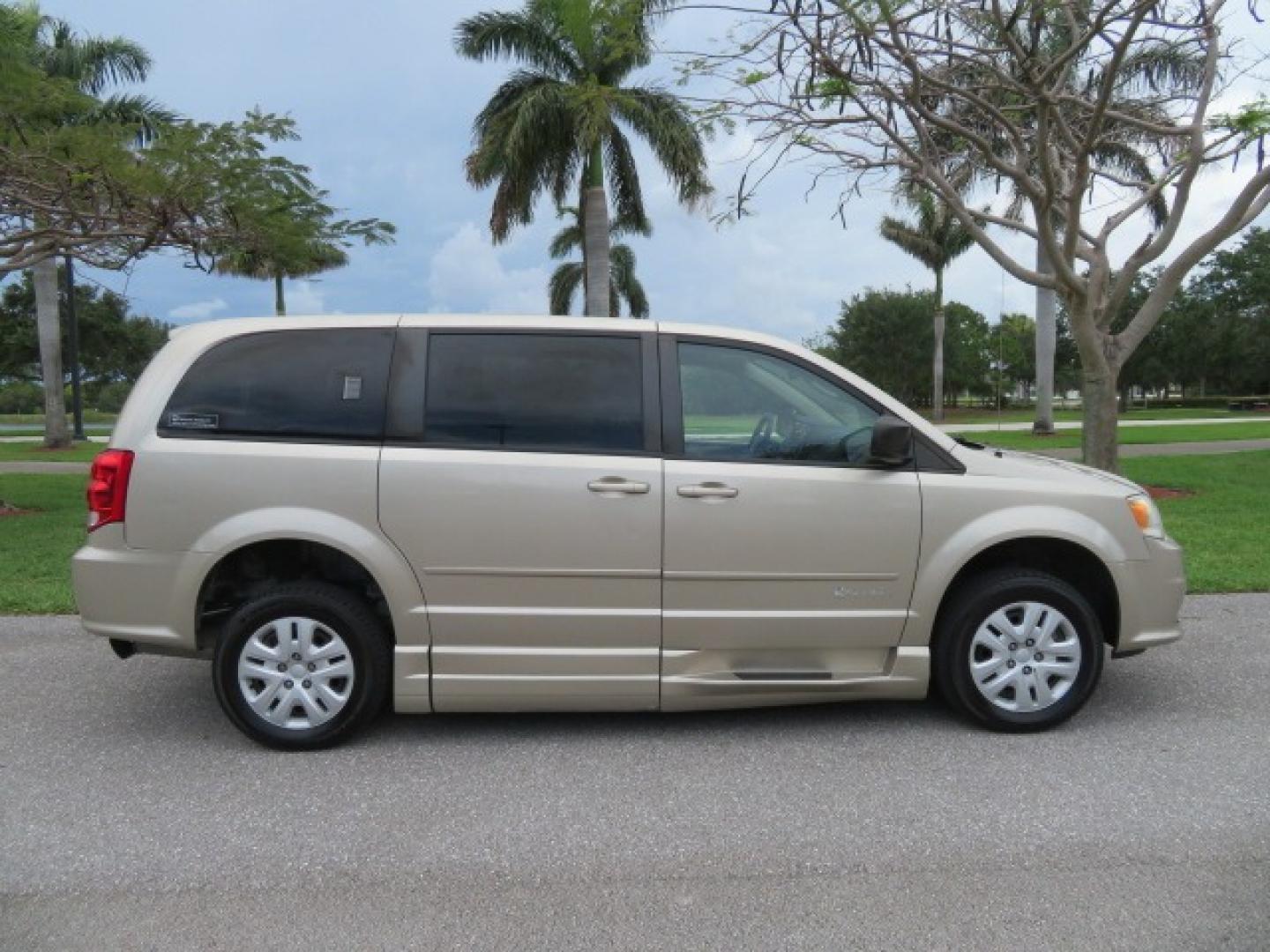 2013 Gold /Tan Dodge Grand Caravan SE (2C4RDGBG8DR) with an 3.6L V6 DOHC 24V engine, 6-Speed Automatic transmission, located at 4301 Oak Circle #19, Boca Raton, FL, 33431, (954) 561-2499, 26.388861, -80.084038 - You are looking at a Gorgeous 2015 Dodge Grand Caravan Braunability Handicap Wheelchair Side Entry, Conversion Van with 18K Original Miles, Lowered Floor, Kneelvan, EZ Lock Passenger Side, Q Straint Ratchet Tie Down System, Quick Release Front Seats, and Much Much More. This is a Beautiful Florida V - Photo#7