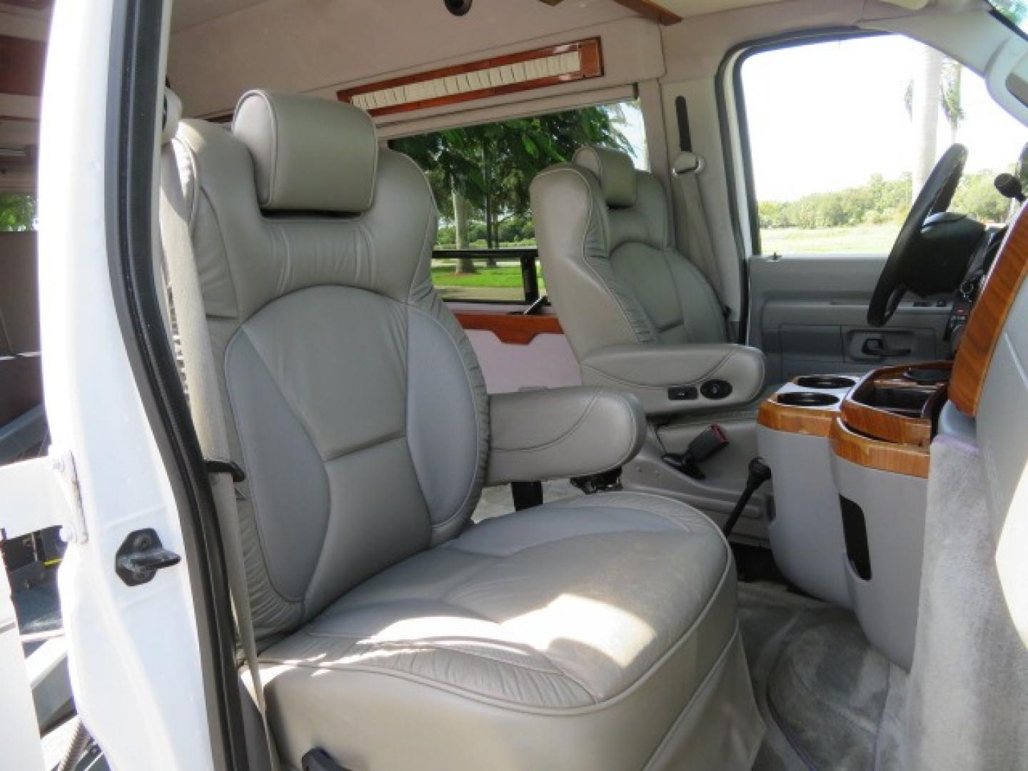 2010 White Ford E-Series Van E-350 Super Duty (1FTSE3ESXAD) with an 6.8L V10 SOHC 20V engine, located at 4301 Oak Circle #19, Boca Raton, FL, 33431, (954) 561-2499, 26.388861, -80.084038 - You are looking at a Beautiful and Extremely Rare 2010 Ford Econoline E350 Super Duty High Top Quigley 4x4 Handicap Wheelchair Conversion Van. This is a very nice Rust Free and Smoke Free Conversion Van with a Clean Carfax and Clean Title. No Stories and No Issues. This van is fully loaded with all - Photo#117