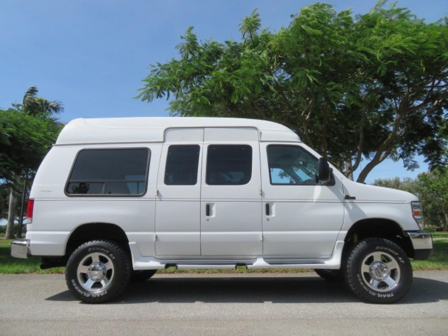 2010 White Ford E-Series Van E-350 Super Duty (1FTSE3ESXAD) with an 6.8L V10 SOHC 20V engine, located at 4301 Oak Circle #19, Boca Raton, FL, 33431, (954) 561-2499, 26.388861, -80.084038 - You are looking at a Beautiful and Extremely Rare 2010 Ford Econoline E350 Super Duty High Top Quigley 4x4 Handicap Wheelchair Conversion Van. This is a very nice Rust Free and Smoke Free Conversion Van with a Clean Carfax and Clean Title. No Stories and No Issues. This van is fully loaded with all - Photo#4