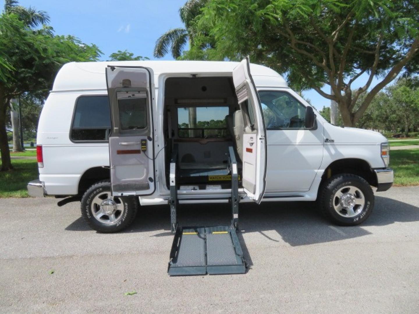 2010 White Ford E-Series Van E-350 Super Duty (1FTSE3ESXAD) with an 6.8L V10 SOHC 20V engine, located at 4301 Oak Circle #19, Boca Raton, FL, 33431, (954) 561-2499, 26.388861, -80.084038 - You are looking at a Beautiful and Extremely Rare 2010 Ford Econoline E350 Super Duty High Top Quigley 4x4 Handicap Wheelchair Conversion Van. This is a very nice Rust Free and Smoke Free Conversion Van with a Clean Carfax and Clean Title. No Stories and No Issues. This van is fully loaded with all - Photo#64