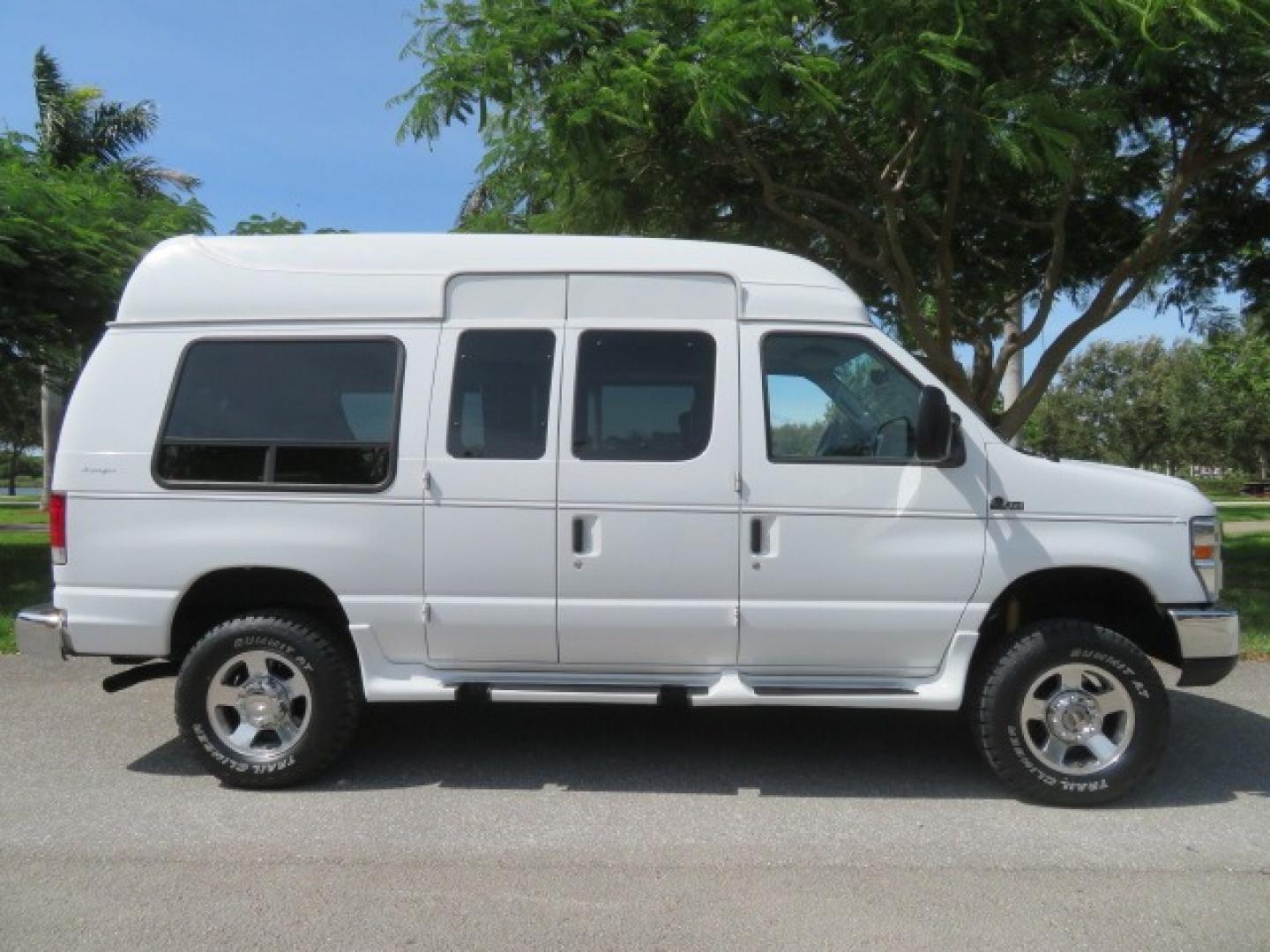 2010 White Ford E-Series Van E-350 Super Duty (1FTSE3ESXAD) with an 6.8L V10 SOHC 20V engine, located at 4301 Oak Circle #19, Boca Raton, FL, 33431, (954) 561-2499, 26.388861, -80.084038 - You are looking at a Beautiful and Extremely Rare 2010 Ford Econoline E350 Super Duty High Top Quigley 4x4 Handicap Wheelchair Conversion Van. This is a very nice Rust Free and Smoke Free Conversion Van with a Clean Carfax and Clean Title. No Stories and No Issues. This van is fully loaded with all - Photo#6