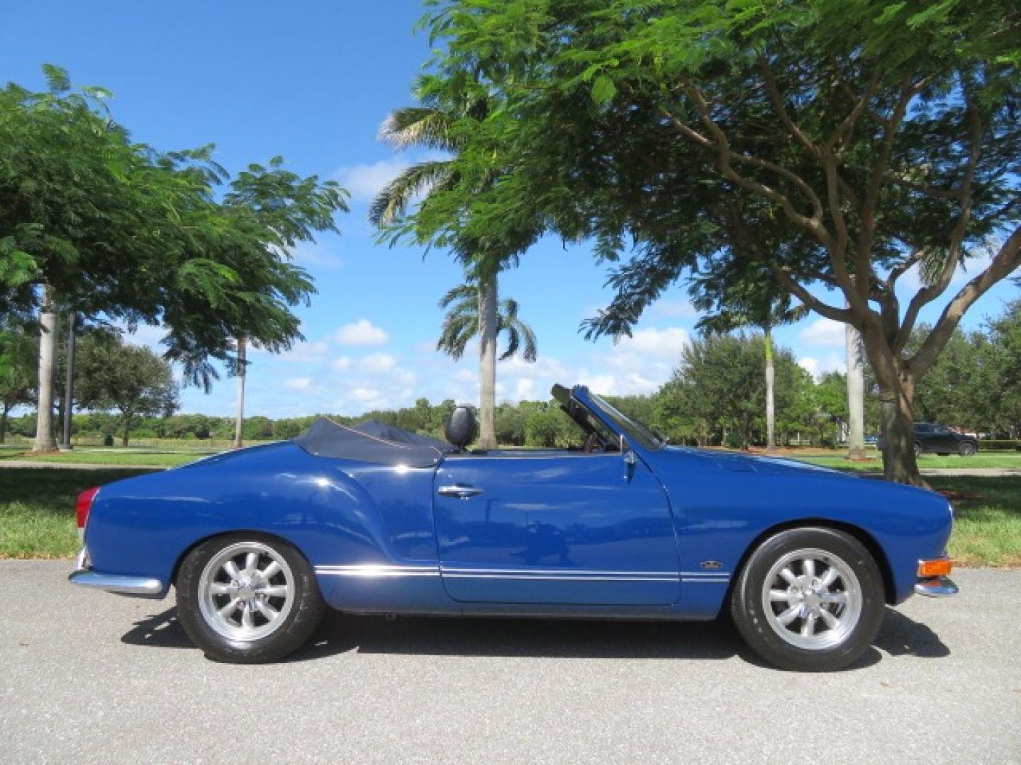 1969 Dark Blue /Black Volkswagen Karman Ghia (1402202391) with an 1.5 Liter engine, 4 Speed Manual transmission, located at 4301 Oak Circle #19, Boca Raton, FL, 33431, (954) 561-2499, 26.388861, -80.084038 - You are looking at a Beautiful 1969 VW Volkswagen Karman Ghia Convertible Cabriolet Blue with Black Interior Black Convertible Top 4 Speed Manual. This is a Very Nice Rust Free Florida Car that comes with a ton of records and service history. This particular car was purchased in Miami brand new and - Photo#1