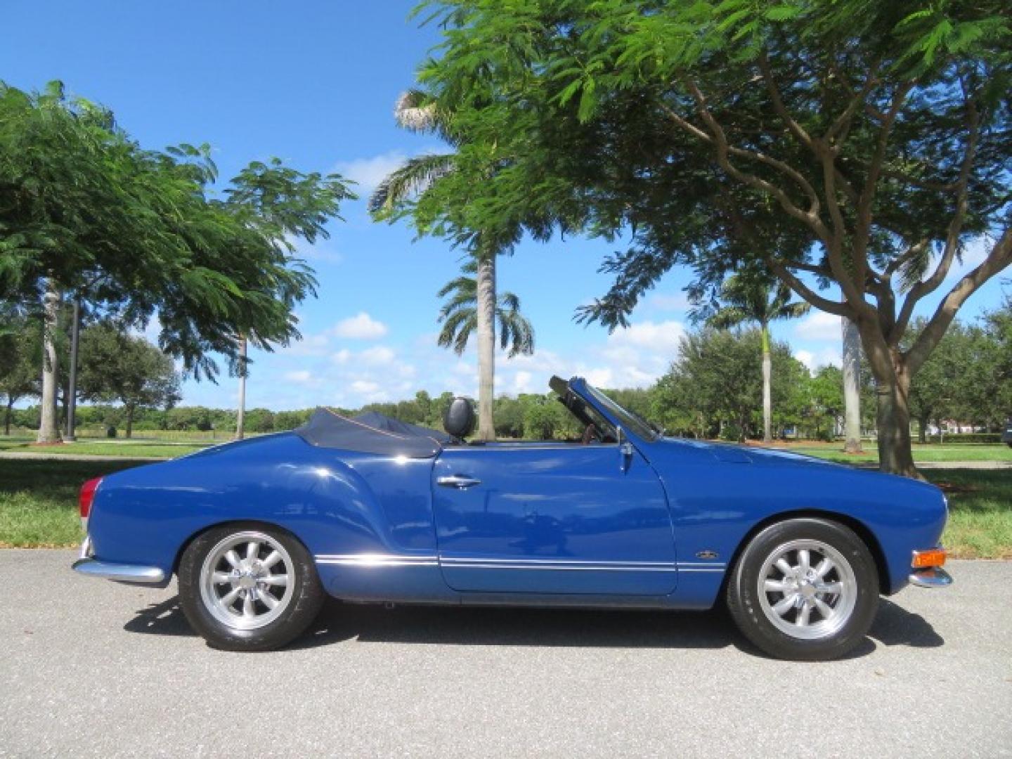 1969 Dark Blue /Black Volkswagen Karman Ghia (1402202391) with an 1.5 Liter engine, 4 Speed Manual transmission, located at 4301 Oak Circle #19, Boca Raton, FL, 33431, (954) 561-2499, 26.388861, -80.084038 - You are looking at a Beautiful 1969 VW Volkswagen Karman Ghia Convertible Cabriolet Blue with Black Interior Black Convertible Top 4 Speed Manual. This is a Very Nice Rust Free Florida Car that comes with a ton of records and service history. This particular car was purchased in Miami brand new and - Photo#2