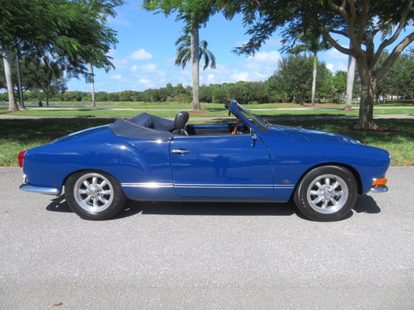 1969 Dark Blue /Black Volkswagen Karman Ghia (1402202391) with an 1.5 Liter engine, 4 Speed Manual transmission, located at 4301 Oak Circle #19, Boca Raton, FL, 33431, (954) 561-2499, 26.388861, -80.084038 - You are looking at a Beautiful 1969 VW Volkswagen Karman Ghia Convertible Cabriolet Blue with Black Interior Black Convertible Top 4 Speed Manual. This is a Very Nice Rust Free Florida Car that comes with a ton of records and service history. This particular car was purchased in Miami brand new and - Photo#3