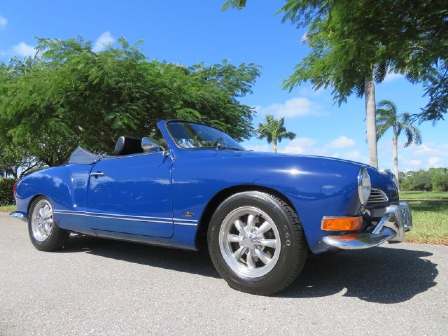 1969 Dark Blue /Black Volkswagen Karman Ghia (1402202391) with an 1.5 Liter engine, 4 Speed Manual transmission, located at 4301 Oak Circle #19, Boca Raton, FL, 33431, (954) 561-2499, 26.388861, -80.084038 - You are looking at a Beautiful 1969 VW Volkswagen Karman Ghia Convertible Cabriolet Blue with Black Interior Black Convertible Top 4 Speed Manual. This is a Very Nice Rust Free Florida Car that comes with a ton of records and service history. This particular car was purchased in Miami brand new and - Photo#4