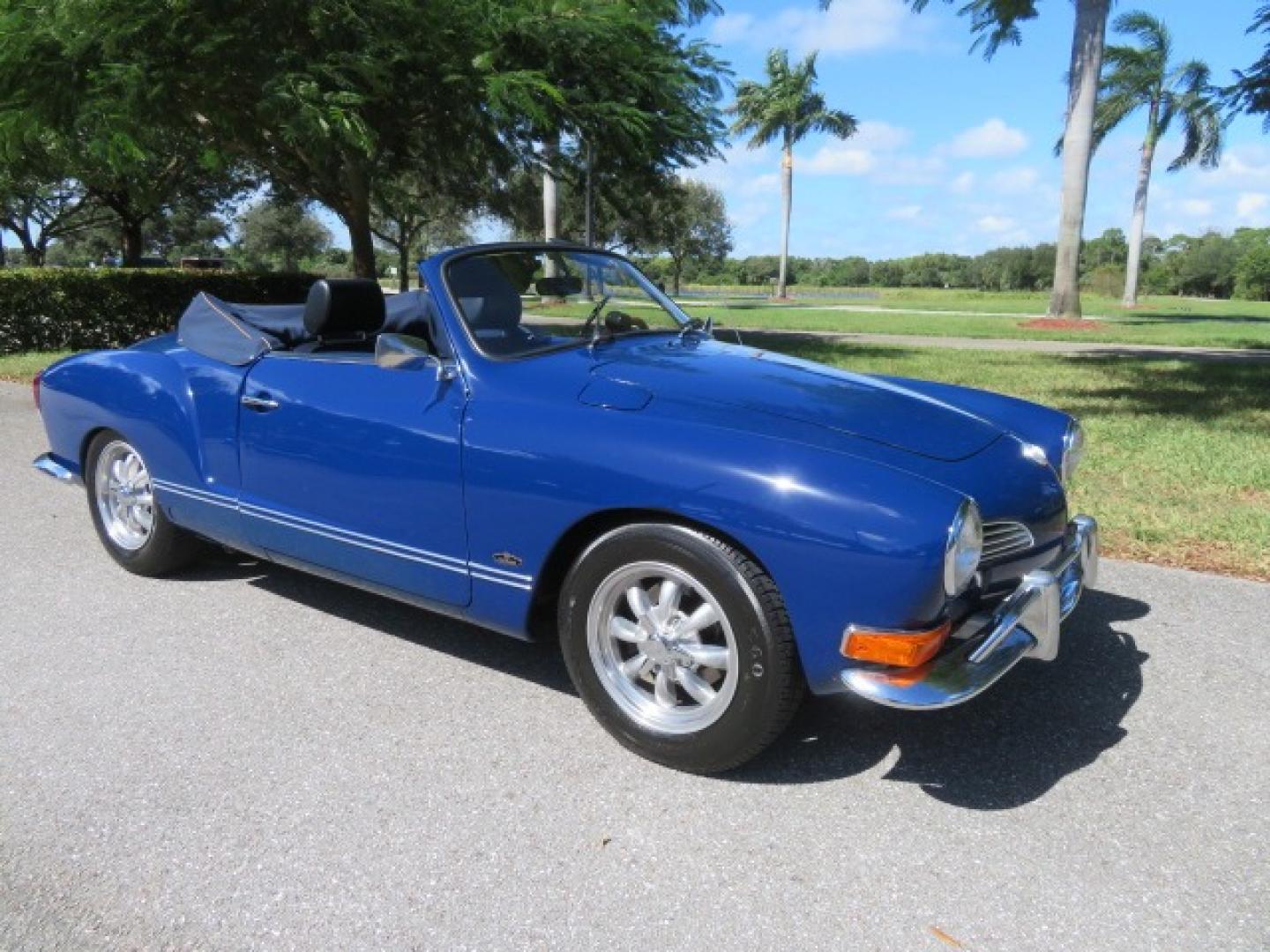 1969 Dark Blue /Black Volkswagen Karman Ghia (1402202391) with an 1.5 Liter engine, 4 Speed Manual transmission, located at 4301 Oak Circle #19, Boca Raton, FL, 33431, (954) 561-2499, 26.388861, -80.084038 - You are looking at a Beautiful 1969 VW Volkswagen Karman Ghia Convertible Cabriolet Blue with Black Interior Black Convertible Top 4 Speed Manual. This is a Very Nice Rust Free Florida Car that comes with a ton of records and service history. This particular car was purchased in Miami brand new and - Photo#6