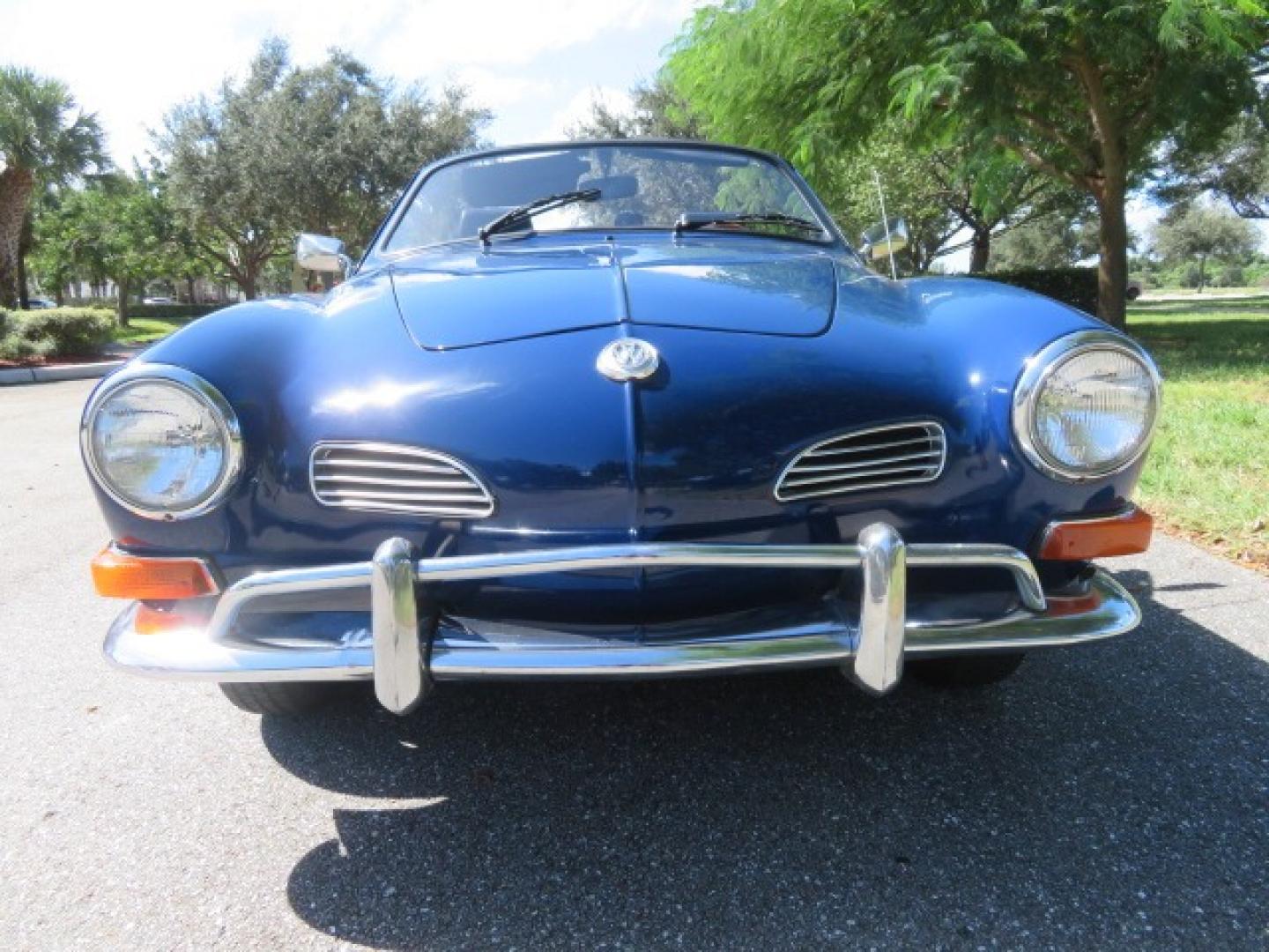 1969 Dark Blue /Black Volkswagen Karman Ghia (1402202391) with an 1.5 Liter engine, 4 Speed Manual transmission, located at 4301 Oak Circle #19, Boca Raton, FL, 33431, (954) 561-2499, 26.388861, -80.084038 - You are looking at a Beautiful 1969 VW Volkswagen Karman Ghia Convertible Cabriolet Blue with Black Interior Black Convertible Top 4 Speed Manual. This is a Very Nice Rust Free Florida Car that comes with a ton of records and service history. This particular car was purchased in Miami brand new and - Photo#7