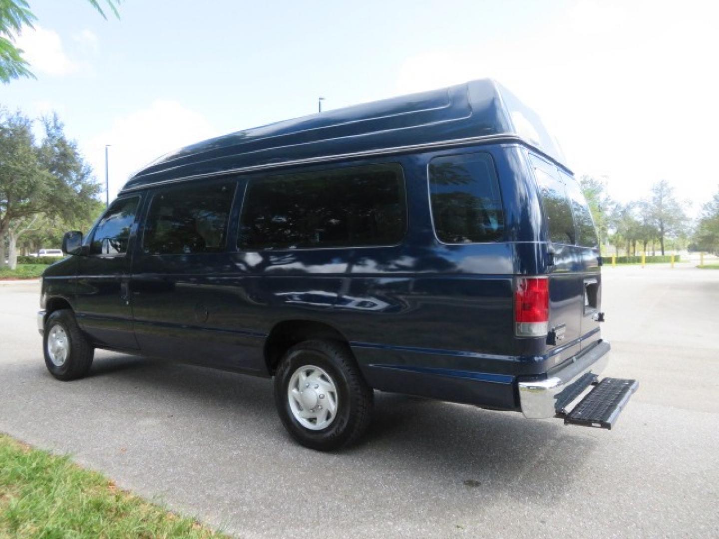 2013 Dark Blue /Gray Ford E-Series Van E-250 Extended (1FTNS2EW4DD) with an 4.6L V8 SOHC 16V engine, 4-Speed Automatic transmission, located at 4301 Oak Circle #19, Boca Raton, FL, 33431, (954) 561-2499, 26.388861, -80.084038 - You are looking at a Beautiful 2013 Ford Econoline E250 Extended handicap wheelchair conversion van with 37K Original Miles, Braun Century 2 800LB Commercial Side Entry Wheelchair Lift, Raised Side Entry, Hard Rubber Floor in the rear, Rear Jump Seats, Rear Folding Seat, Q Straint Tie Down System th - Photo#9