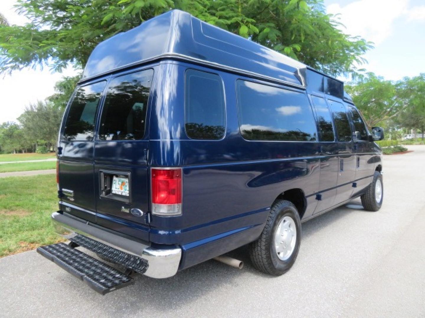 2013 Dark Blue /Gray Ford E-Series Van E-250 Extended (1FTNS2EW4DD) with an 4.6L V8 SOHC 16V engine, 4-Speed Automatic transmission, located at 4301 Oak Circle #19, Boca Raton, FL, 33431, (954) 561-2499, 26.388861, -80.084038 - You are looking at a Beautiful 2013 Ford Econoline E250 Extended handicap wheelchair conversion van with 37K Original Miles, Braun Century 2 800LB Commercial Side Entry Wheelchair Lift, Raised Side Entry, Hard Rubber Floor in the rear, Rear Jump Seats, Rear Folding Seat, Q Straint Tie Down System th - Photo#12