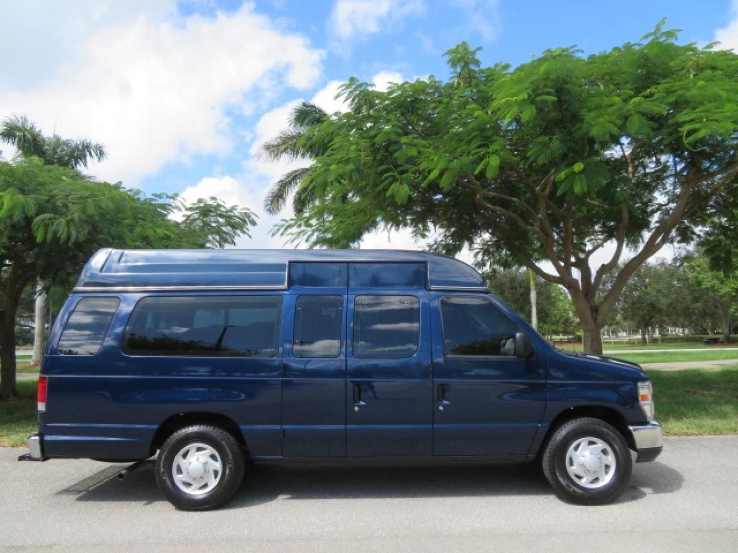 2013 Dark Blue /Gray Ford E-Series Van E-250 Extended (1FTNS2EW4DD) with an 4.6L V8 SOHC 16V engine, 4-Speed Automatic transmission, located at 4301 Oak Circle #19, Boca Raton, FL, 33431, (954) 561-2499, 26.388861, -80.084038 - You are looking at a Beautiful 2013 Ford Econoline E250 Extended handicap wheelchair conversion van with 37K Original Miles, Braun Century 2 800LB Commercial Side Entry Wheelchair Lift, Raised Side Entry, Hard Rubber Floor in the rear, Rear Jump Seats, Rear Folding Seat, Q Straint Tie Down System th - Photo#1