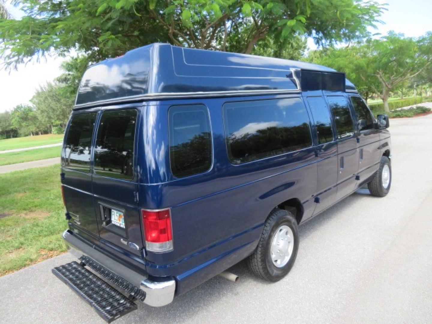 2013 Dark Blue /Gray Ford E-Series Van E-250 Extended (1FTNS2EW4DD) with an 4.6L V8 SOHC 16V engine, 4-Speed Automatic transmission, located at 4301 Oak Circle #19, Boca Raton, FL, 33431, (954) 561-2499, 26.388861, -80.084038 - You are looking at a Beautiful 2013 Ford Econoline E250 Extended handicap wheelchair conversion van with 37K Original Miles, Braun Century 2 800LB Commercial Side Entry Wheelchair Lift, Raised Side Entry, Hard Rubber Floor in the rear, Rear Jump Seats, Rear Folding Seat, Q Straint Tie Down System th - Photo#21