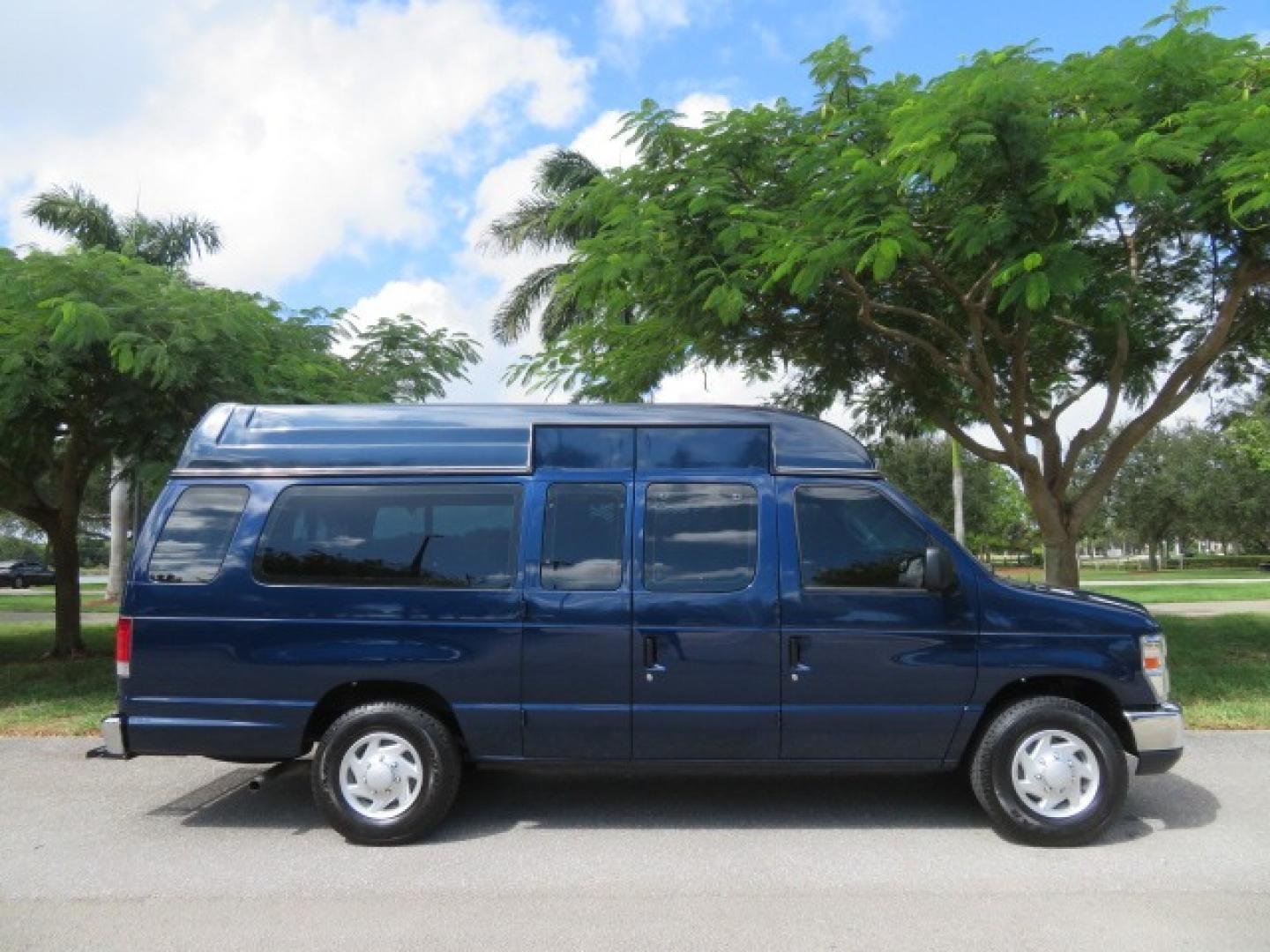 2013 Dark Blue /Gray Ford E-Series Van E-250 Extended (1FTNS2EW4DD) with an 4.6L V8 SOHC 16V engine, 4-Speed Automatic transmission, located at 4301 Oak Circle #19, Boca Raton, FL, 33431, (954) 561-2499, 26.388861, -80.084038 - You are looking at a Beautiful 2013 Ford Econoline E250 Extended handicap wheelchair conversion van with 37K Original Miles, Braun Century 2 800LB Commercial Side Entry Wheelchair Lift, Raised Side Entry, Hard Rubber Floor in the rear, Rear Jump Seats, Rear Folding Seat, Q Straint Tie Down System th - Photo#2