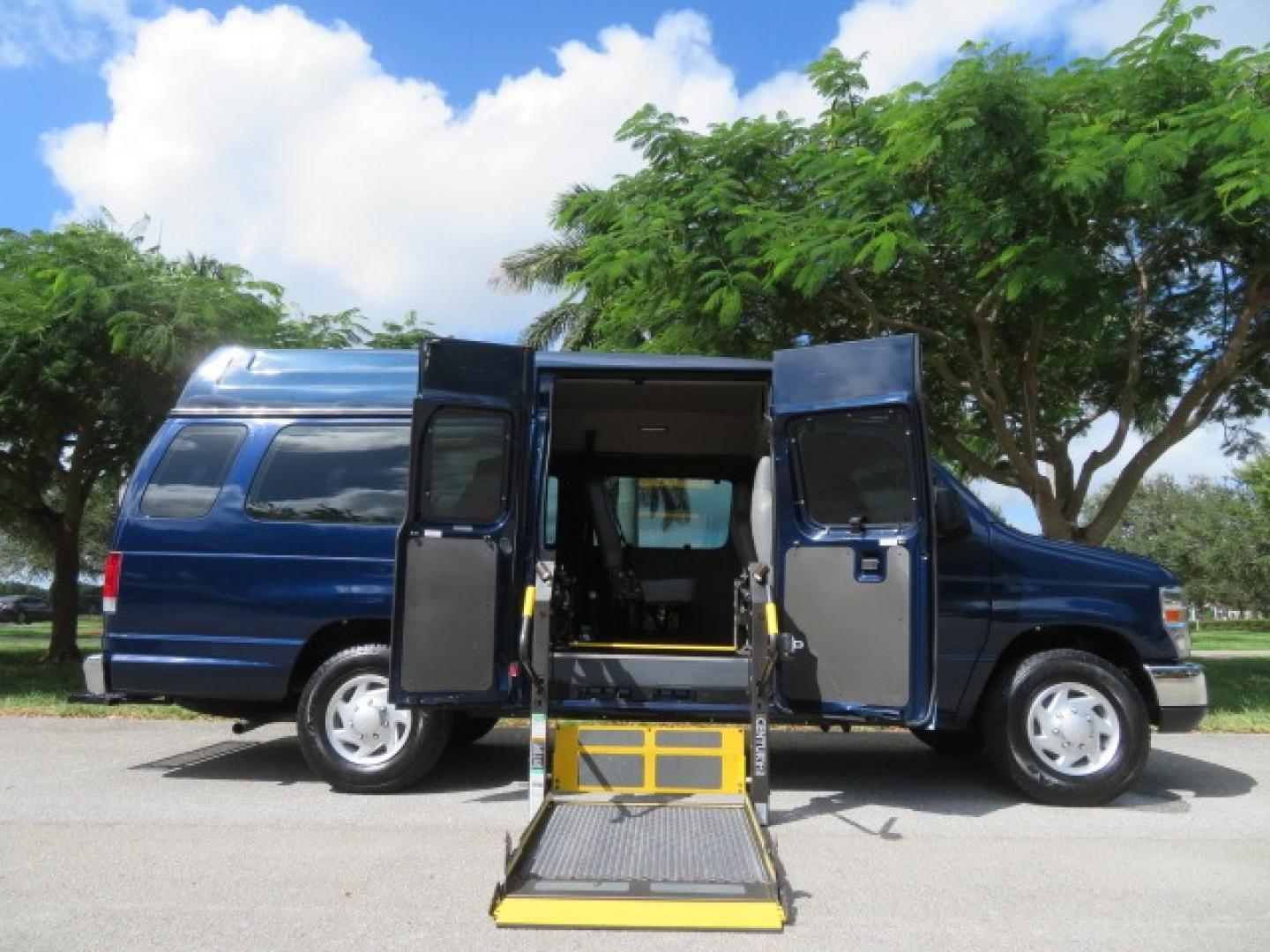 2013 Dark Blue /Gray Ford E-Series Van E-250 Extended (1FTNS2EW4DD) with an 4.6L V8 SOHC 16V engine, 4-Speed Automatic transmission, located at 4301 Oak Circle #19, Boca Raton, FL, 33431, (954) 561-2499, 26.388861, -80.084038 - You are looking at a Beautiful 2013 Ford Econoline E250 Extended handicap wheelchair conversion van with 37K Original Miles, Braun Century 2 800LB Commercial Side Entry Wheelchair Lift, Raised Side Entry, Hard Rubber Floor in the rear, Rear Jump Seats, Rear Folding Seat, Q Straint Tie Down System th - Photo#34