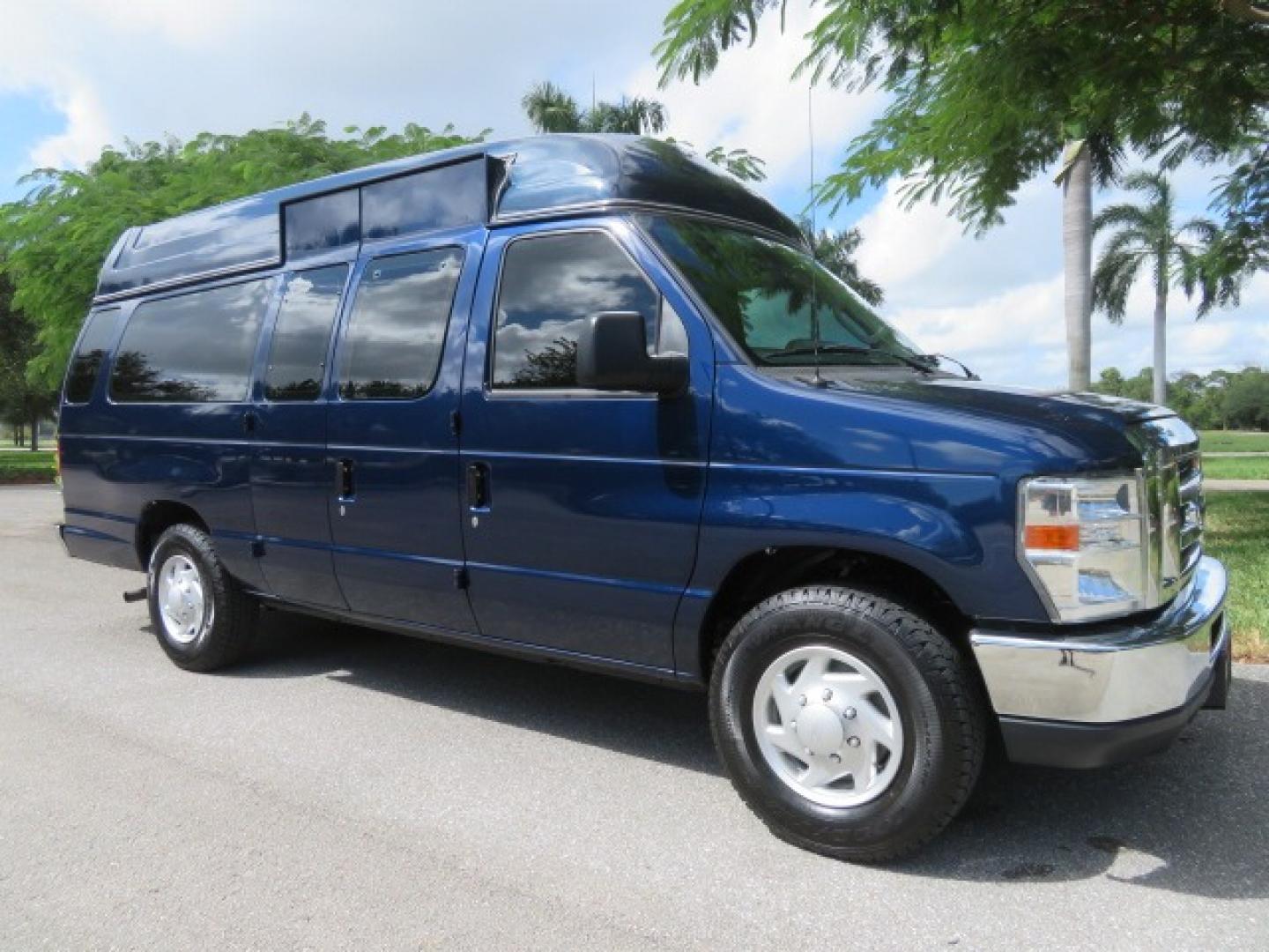 2013 Dark Blue /Gray Ford E-Series Van E-250 Extended (1FTNS2EW4DD) with an 4.6L V8 SOHC 16V engine, 4-Speed Automatic transmission, located at 4301 Oak Circle #19, Boca Raton, FL, 33431, (954) 561-2499, 26.388861, -80.084038 - You are looking at a Beautiful 2013 Ford Econoline E250 Extended handicap wheelchair conversion van with 37K Original Miles, Braun Century 2 800LB Commercial Side Entry Wheelchair Lift, Raised Side Entry, Hard Rubber Floor in the rear, Rear Jump Seats, Rear Folding Seat, Q Straint Tie Down System th - Photo#3