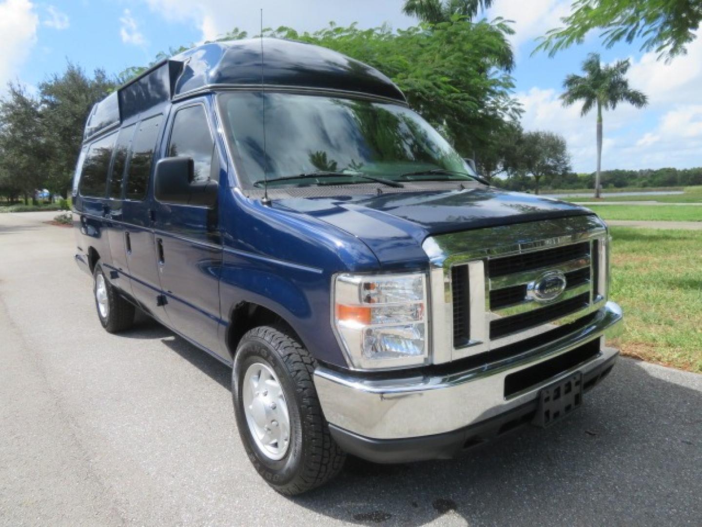 2013 Dark Blue /Gray Ford E-Series Van E-250 Extended (1FTNS2EW4DD) with an 4.6L V8 SOHC 16V engine, 4-Speed Automatic transmission, located at 4301 Oak Circle #19, Boca Raton, FL, 33431, (954) 561-2499, 26.388861, -80.084038 - You are looking at a Beautiful 2013 Ford Econoline E250 Extended handicap wheelchair conversion van with 37K Original Miles, Braun Century 2 800LB Commercial Side Entry Wheelchair Lift, Raised Side Entry, Hard Rubber Floor in the rear, Rear Jump Seats, Rear Folding Seat, Q Straint Tie Down System th - Photo#4