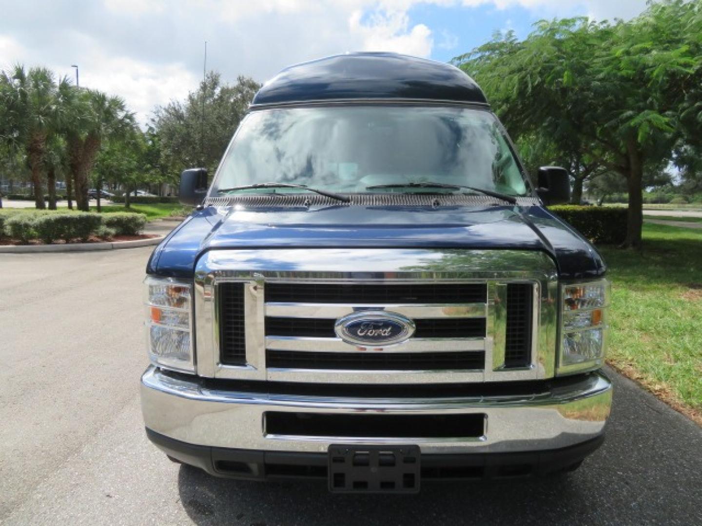 2013 Dark Blue /Gray Ford E-Series Van E-250 Extended (1FTNS2EW4DD) with an 4.6L V8 SOHC 16V engine, 4-Speed Automatic transmission, located at 4301 Oak Circle #19, Boca Raton, FL, 33431, (954) 561-2499, 26.388861, -80.084038 - You are looking at a Beautiful 2013 Ford Econoline E250 Extended handicap wheelchair conversion van with 37K Original Miles, Braun Century 2 800LB Commercial Side Entry Wheelchair Lift, Raised Side Entry, Hard Rubber Floor in the rear, Rear Jump Seats, Rear Folding Seat, Q Straint Tie Down System th - Photo#5