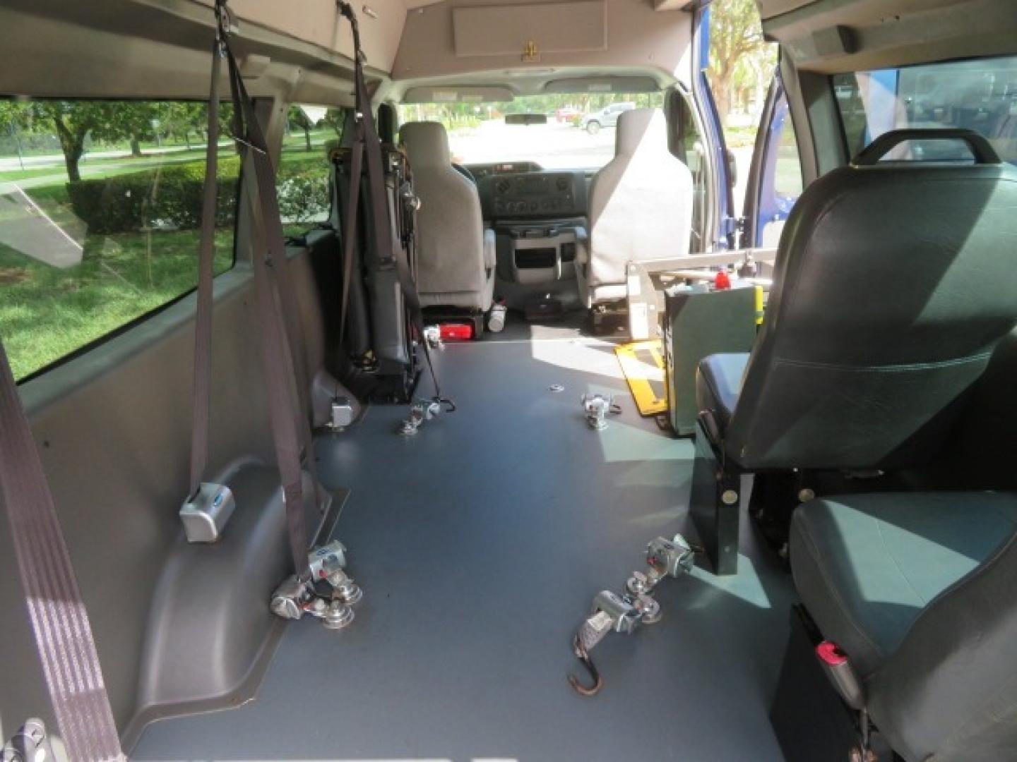 2013 Dark Blue /Gray Ford E-Series Van E-250 Extended (1FTNS2EW4DD) with an 4.6L V8 SOHC 16V engine, 4-Speed Automatic transmission, located at 4301 Oak Circle #19, Boca Raton, FL, 33431, (954) 561-2499, 26.388861, -80.084038 - You are looking at a Beautiful 2013 Ford Econoline E250 Extended handicap wheelchair conversion van with 37K Original Miles, Braun Century 2 800LB Commercial Side Entry Wheelchair Lift, Raised Side Entry, Hard Rubber Floor in the rear, Rear Jump Seats, Rear Folding Seat, Q Straint Tie Down System th - Photo#63