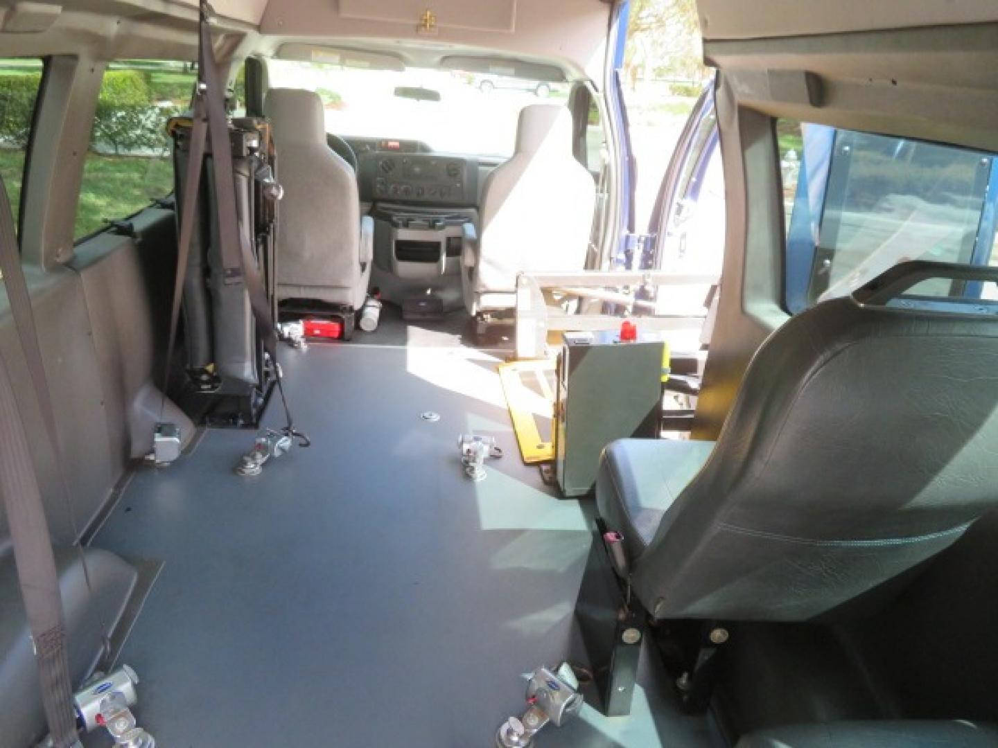 2013 Dark Blue /Gray Ford E-Series Van E-250 Extended (1FTNS2EW4DD) with an 4.6L V8 SOHC 16V engine, 4-Speed Automatic transmission, located at 4301 Oak Circle #19, Boca Raton, FL, 33431, (954) 561-2499, 26.388861, -80.084038 - You are looking at a Beautiful 2013 Ford Econoline E250 Extended handicap wheelchair conversion van with 37K Original Miles, Braun Century 2 800LB Commercial Side Entry Wheelchair Lift, Raised Side Entry, Hard Rubber Floor in the rear, Rear Jump Seats, Rear Folding Seat, Q Straint Tie Down System th - Photo#65