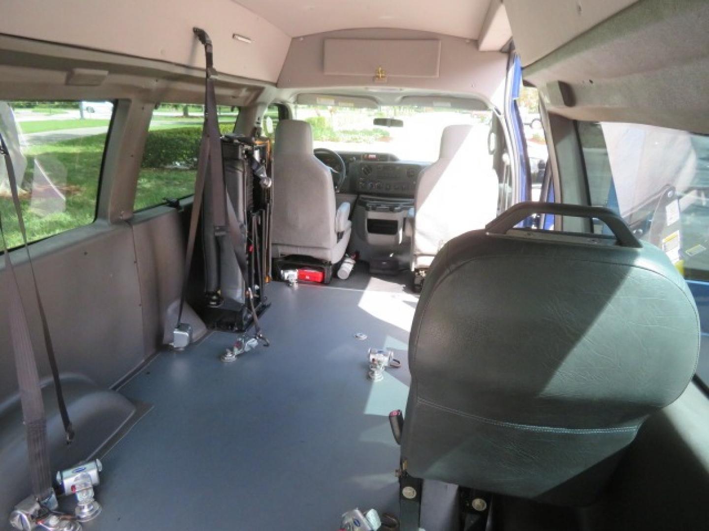 2013 Dark Blue /Gray Ford E-Series Van E-250 Extended (1FTNS2EW4DD) with an 4.6L V8 SOHC 16V engine, 4-Speed Automatic transmission, located at 4301 Oak Circle #19, Boca Raton, FL, 33431, (954) 561-2499, 26.388861, -80.084038 - You are looking at a Beautiful 2013 Ford Econoline E250 Extended handicap wheelchair conversion van with 37K Original Miles, Braun Century 2 800LB Commercial Side Entry Wheelchair Lift, Raised Side Entry, Hard Rubber Floor in the rear, Rear Jump Seats, Rear Folding Seat, Q Straint Tie Down System th - Photo#66