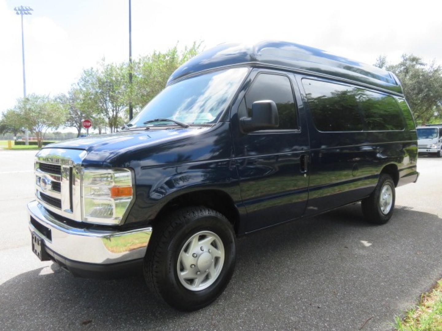 2013 Dark Blue /Gray Ford E-Series Van E-250 Extended (1FTNS2EW4DD) with an 4.6L V8 SOHC 16V engine, 4-Speed Automatic transmission, located at 4301 Oak Circle #19, Boca Raton, FL, 33431, (954) 561-2499, 26.388861, -80.084038 - You are looking at a Beautiful 2013 Ford Econoline E250 Extended handicap wheelchair conversion van with 37K Original Miles, Braun Century 2 800LB Commercial Side Entry Wheelchair Lift, Raised Side Entry, Hard Rubber Floor in the rear, Rear Jump Seats, Rear Folding Seat, Q Straint Tie Down System th - Photo#6