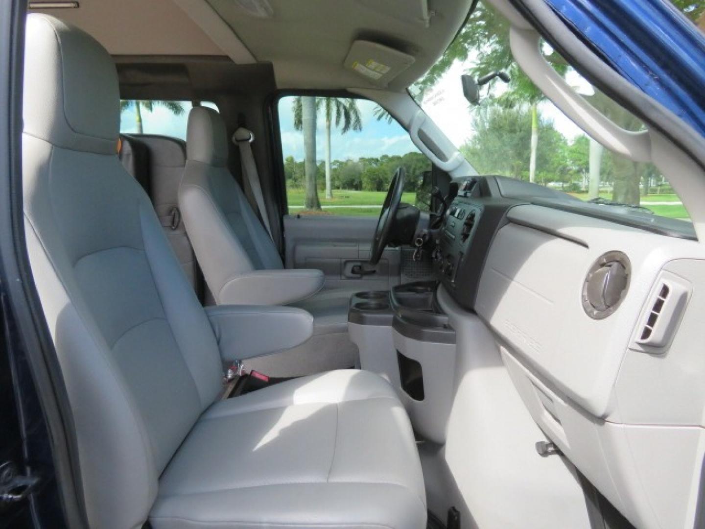 2013 Dark Blue /Gray Ford E-Series Van E-250 Extended (1FTNS2EW4DD) with an 4.6L V8 SOHC 16V engine, 4-Speed Automatic transmission, located at 4301 Oak Circle #19, Boca Raton, FL, 33431, (954) 561-2499, 26.388861, -80.084038 - You are looking at a Beautiful 2013 Ford Econoline E250 Extended handicap wheelchair conversion van with 37K Original Miles, Braun Century 2 800LB Commercial Side Entry Wheelchair Lift, Raised Side Entry, Hard Rubber Floor in the rear, Rear Jump Seats, Rear Folding Seat, Q Straint Tie Down System th - Photo#69