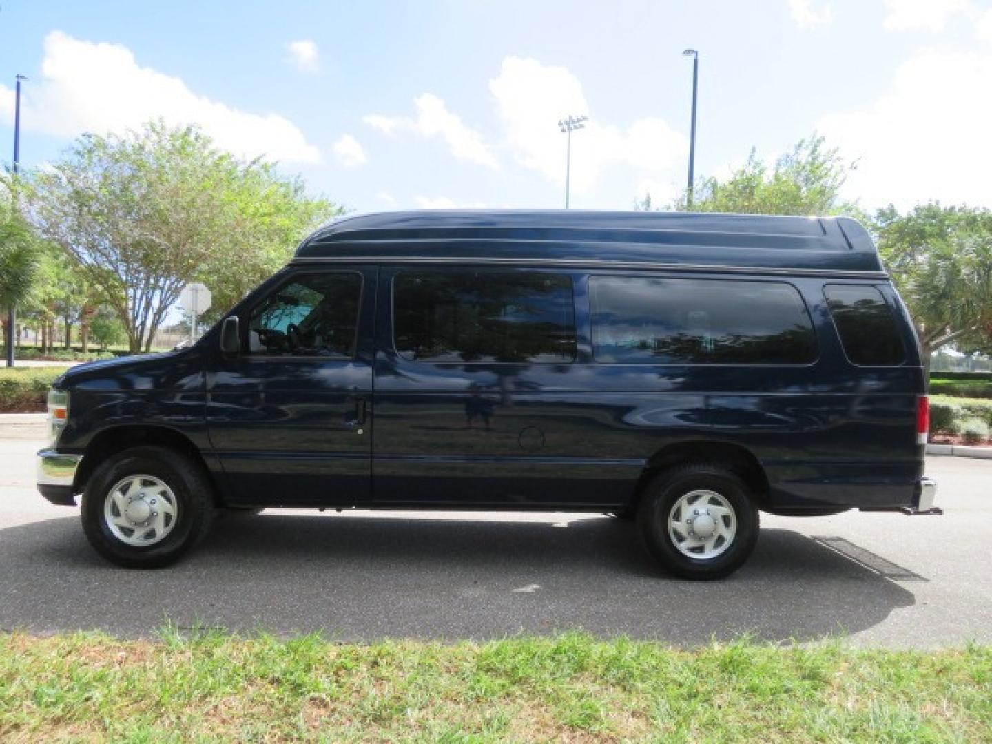 2013 Dark Blue /Gray Ford E-Series Van E-250 Extended (1FTNS2EW4DD) with an 4.6L V8 SOHC 16V engine, 4-Speed Automatic transmission, located at 4301 Oak Circle #19, Boca Raton, FL, 33431, (954) 561-2499, 26.388861, -80.084038 - You are looking at a Beautiful 2013 Ford Econoline E250 Extended handicap wheelchair conversion van with 37K Original Miles, Braun Century 2 800LB Commercial Side Entry Wheelchair Lift, Raised Side Entry, Hard Rubber Floor in the rear, Rear Jump Seats, Rear Folding Seat, Q Straint Tie Down System th - Photo#7