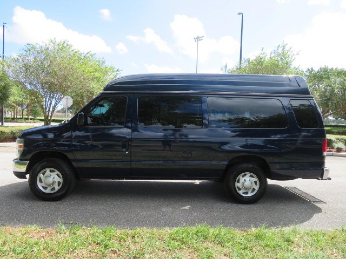 2013 Dark Blue /Gray Ford E-Series Van E-250 Extended (1FTNS2EW4DD) with an 4.6L V8 SOHC 16V engine, 4-Speed Automatic transmission, located at 4301 Oak Circle #19, Boca Raton, FL, 33431, (954) 561-2499, 26.388861, -80.084038 - You are looking at a Beautiful 2013 Ford Econoline E250 Extended handicap wheelchair conversion van with 37K Original Miles, Braun Century 2 800LB Commercial Side Entry Wheelchair Lift, Raised Side Entry, Hard Rubber Floor in the rear, Rear Jump Seats, Rear Folding Seat, Q Straint Tie Down System th - Photo#8