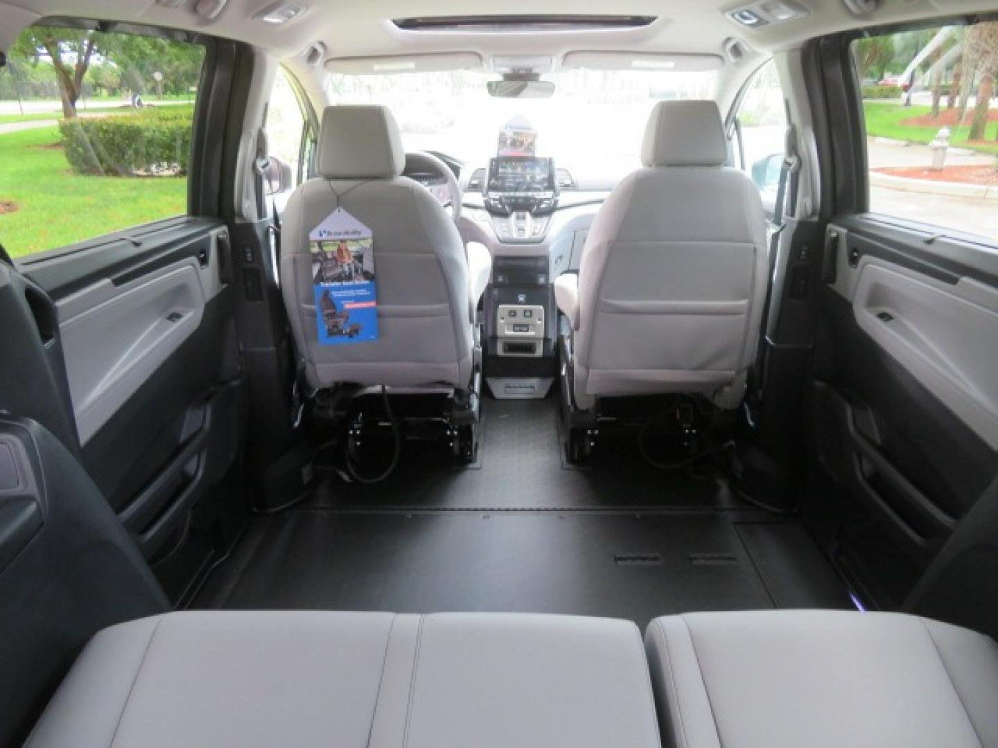 2024 /Gray Honda Odyssey (5FNRL6H60RB) , located at 4301 Oak Circle #19, Boca Raton, FL, 33431, (954) 561-2499, 26.388861, -80.084038 - You are looking at a Brand New New 2024 Honda Odyssey with BraunAbility Side-Entry In Floor XI Power Ramp. Brand New Sienna Braunability Conversion with the XI In Floor Power Ramp and power kneeling Function. Fully Loaded with Leather, Sunroof, Alloy Wheels, Q Straint Tie Down System, 1000lb Capacit - Photo#62