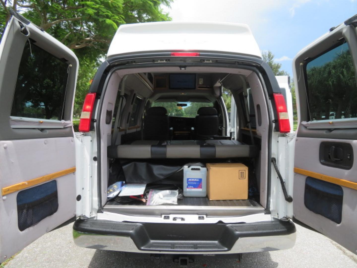 2012 /Gray Two Tone GMC Savana G3500 RWD Diesel Cargo (1GTZ7TCL5C1) with an 6.6L V8 OHV 16V TURBO DIESEL engine, 6-Speed Automatic transmission, located at 4301 Oak Circle #19, Boca Raton, FL, 33431, (954) 561-2499, 26.388861, -80.084038 - You are looking at Gorgeous Rare 1 Owner Rust Free 2012 GMC Savana 3500 Duramax 6.6L Diesel Handicap Wheelchair Conversion Van with 73K Original Miles, Power Side Entry Ricon 600Lb Wheelchair Lift, Leather, Heated Front Seats, Rear Power Folding Bench Seat Bed, Expanded Side Entry Doors, Michelin Ag - Photo#84