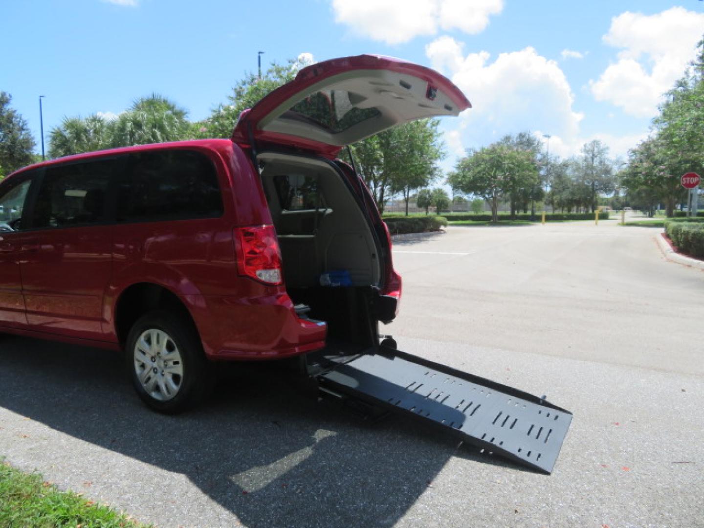 2015 Dodge Grand Caravan SE (2C4RDGBG4FR) with an 3.6L V6 DOHC 24V engine, 6-Speed Automatic transmission, located at 4301 Oak Circle #19, Boca Raton, FL, 33431, (954) 561-2499, 26.388861, -80.084038 - You are looking at a Gorgeous 2015 Dodge Grand Caravan SE Braunability Handicap Wheelchair Conversion Van with only 8100 Original Miles, Rear Entry Manual Ramp System, Rear Folding Seat Option, Rear Q Lock 150 Docking System, Full Power Package, Wheelchair Restraints, Rear Seat Belt Restraint, and M - Photo#45